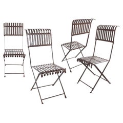 Set of Four Early Handmade Iron Chairs