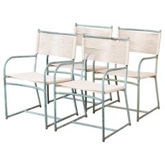 Juego de cuatro sillones antiguos Walter Lamb de bronce para comedor de patio