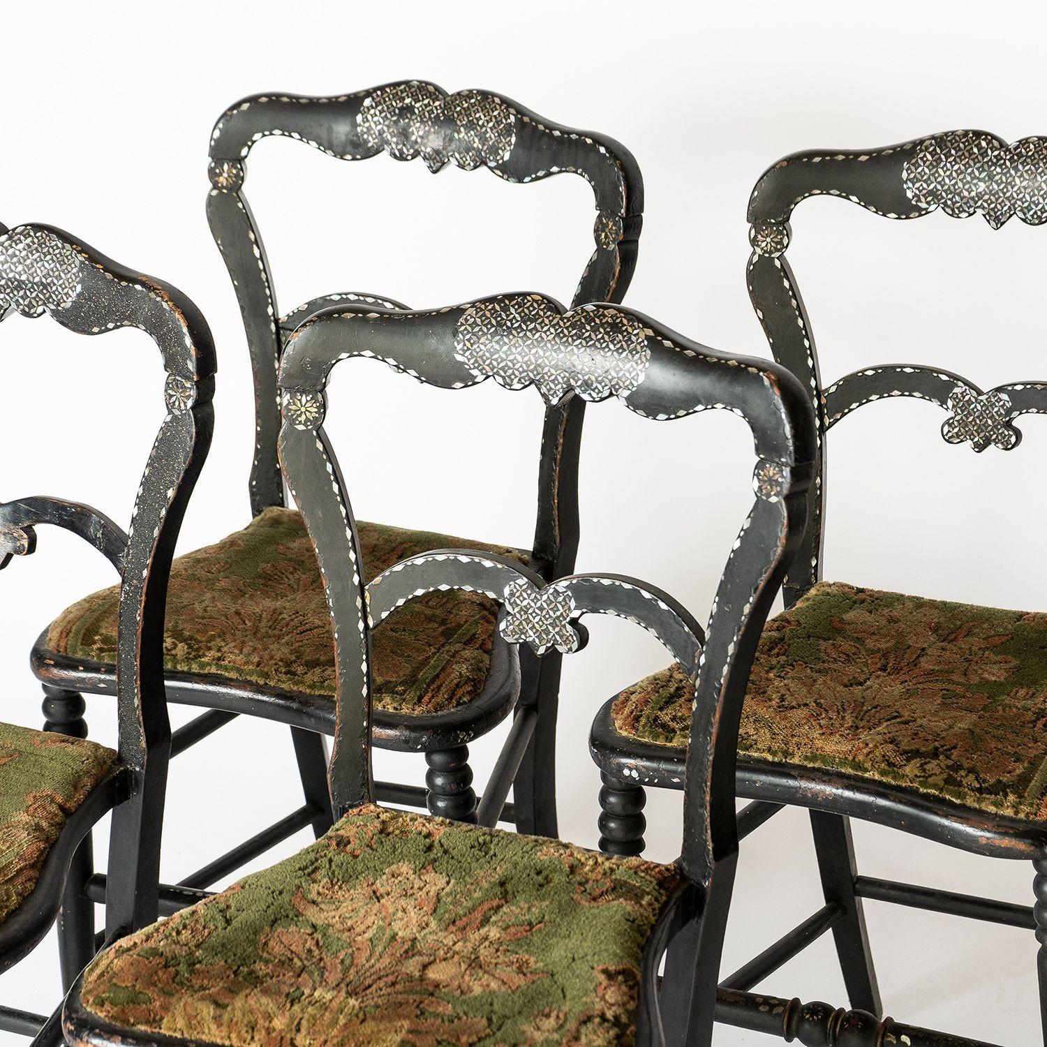 Matching Set of 4 Antique Victorian Parlour/Occasional Chairs

A rare set of matching chairs of this type.

Elegant silhouettes of ebonised wood with inlaid mother-of-pearl decoration.

Victorian green velvet upholstery dating from the late 19th