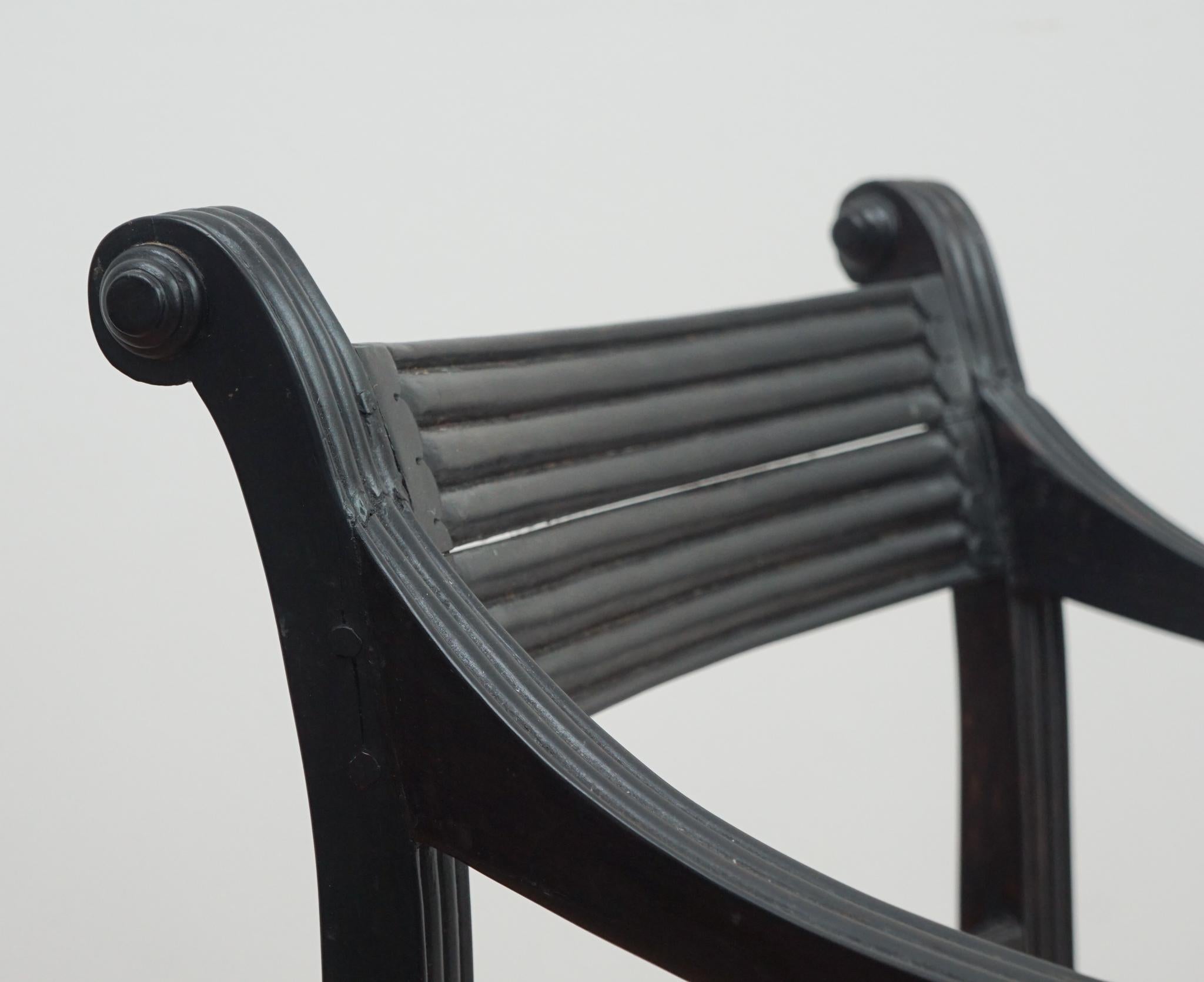 Set of Four Ebony Carved Cane Seat Dining Armchairs For Sale 4