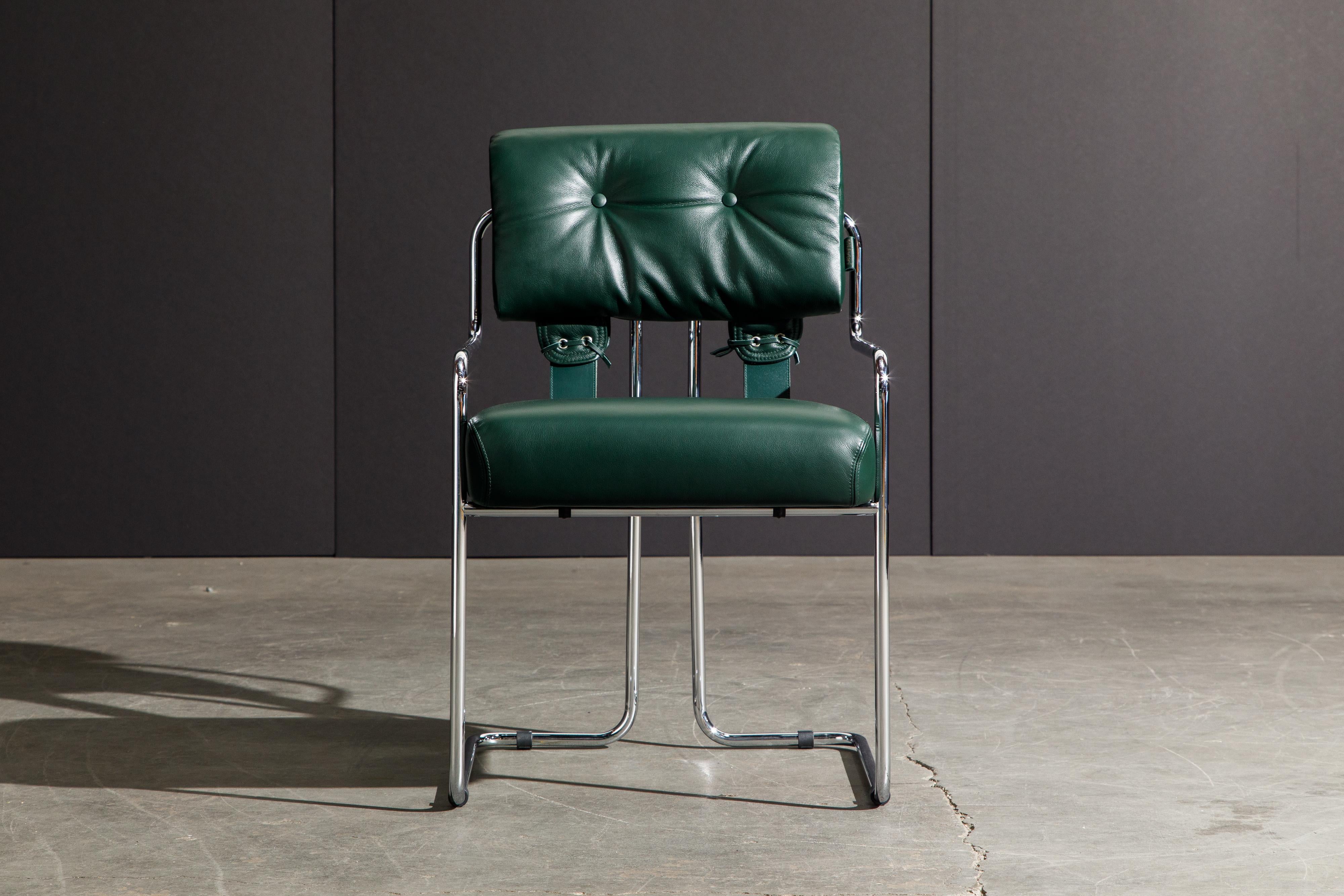 Currently, the most coveted dining chairs by interior designers are 'Tucroma' chairs by Guido Faleschini for i4 Mariani, and we have this incredible set of four (4) Tucroma armchairs in beautiful emerald green leather with polished chrome frames.