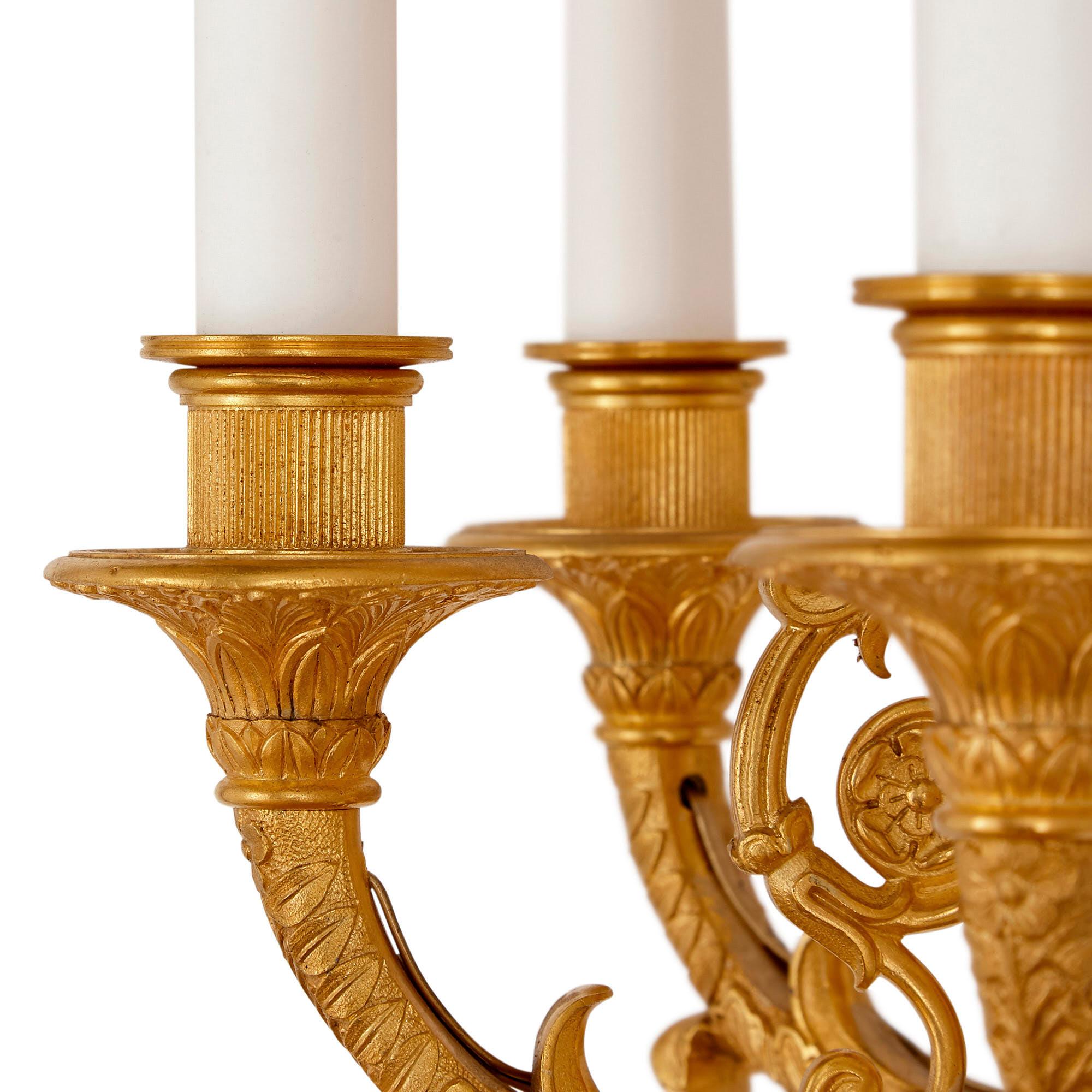 XIXe siècle Ensemble de quatre appliques à dix branches en bronze doré de style Empire en vente