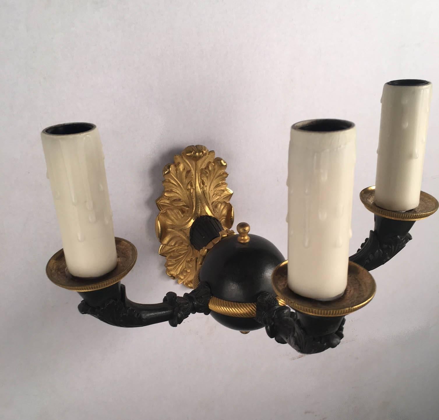 Set of Four Empire Style Three-Light Wall Sconces, Gilt and Patinated In Excellent Condition For Sale In Montreal, QC