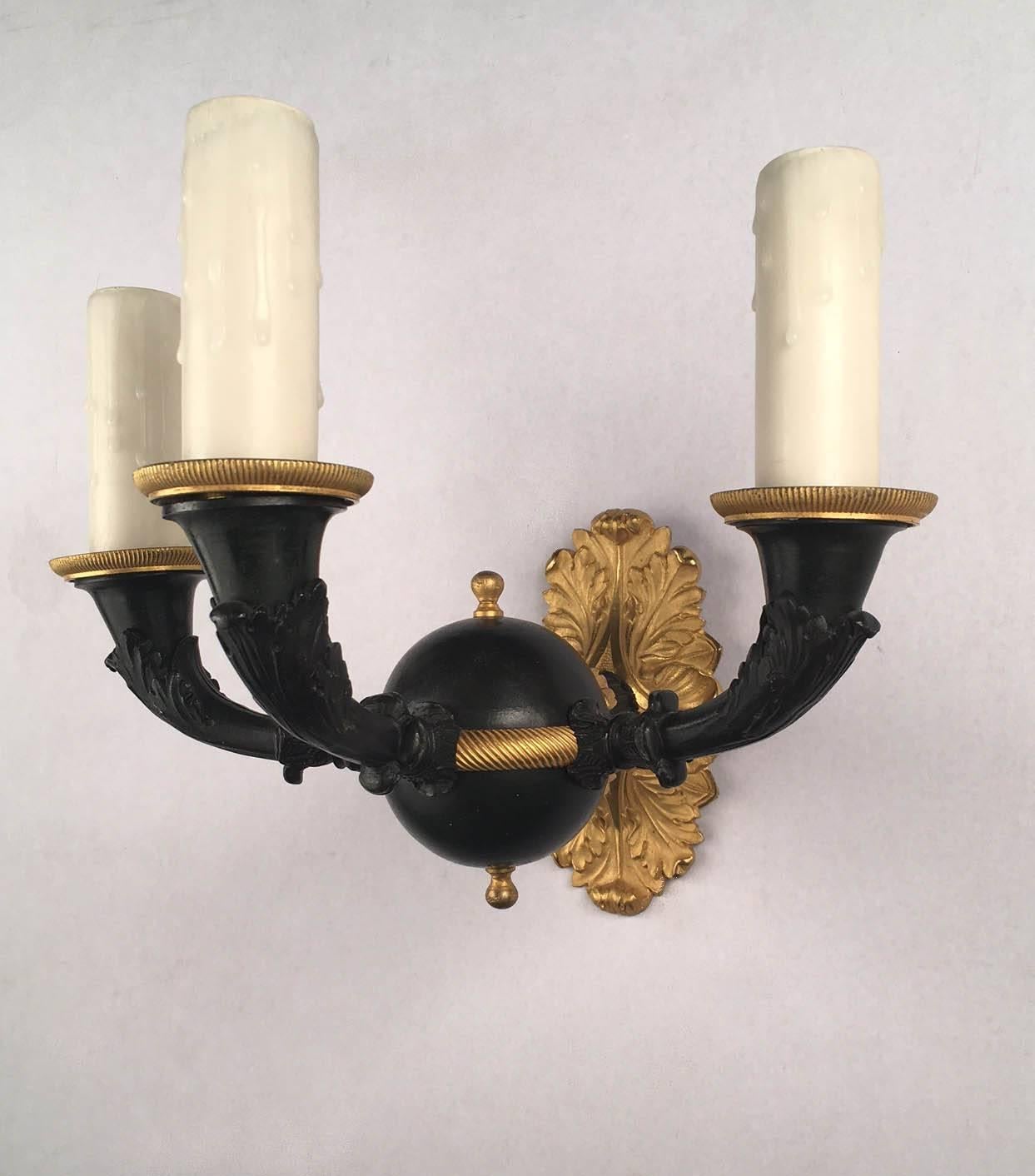 20th Century Set of Four Empire Style Three-Light Wall Sconces, Gilt and Patinated For Sale