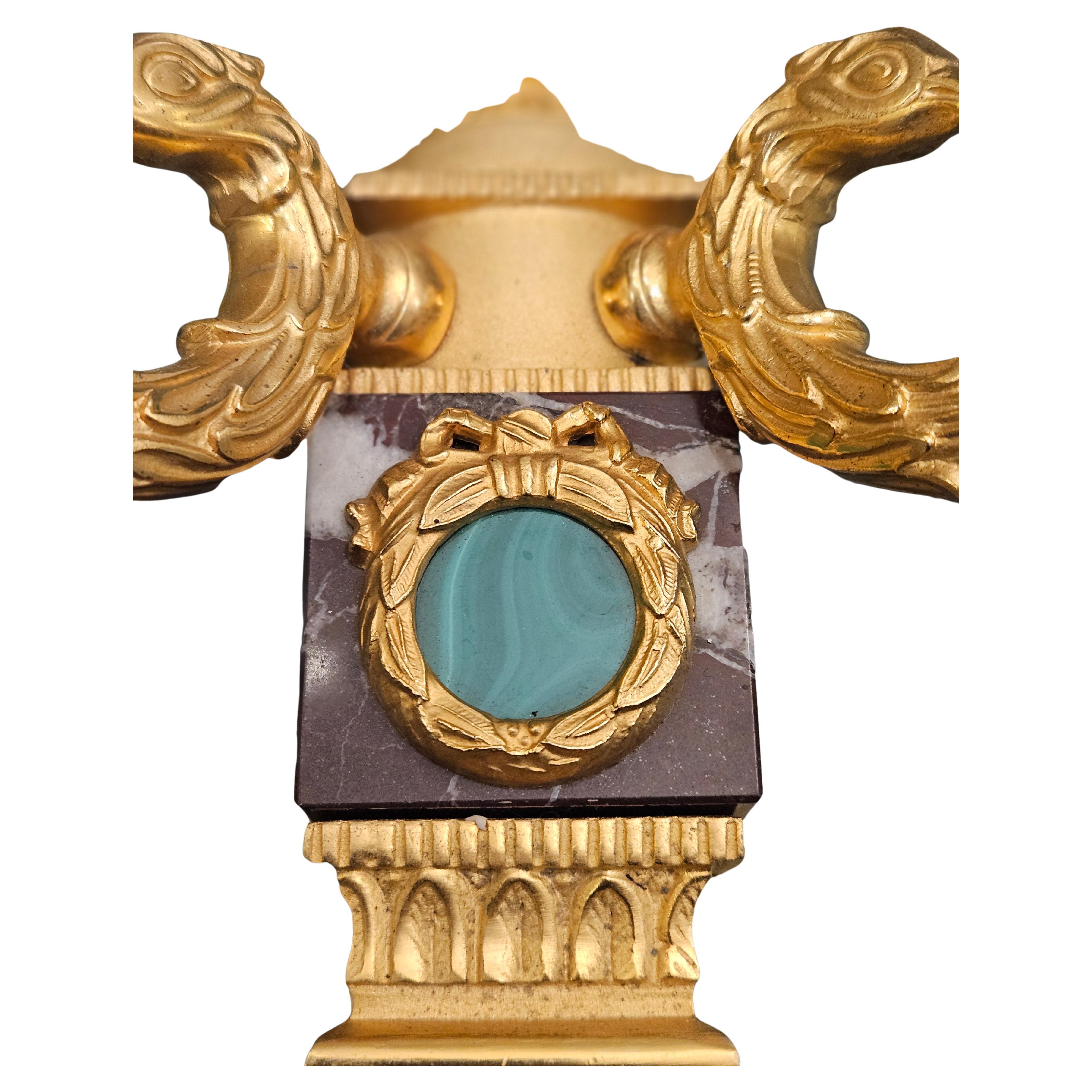 Magnífico conjunto de  cuatro apliques estilo imperio
24 crt acabado dorado
Malaquita incrustada
Diseñado por Giovanni Maria Ma
Estos apliques están totalmente Restaurados y Recableados