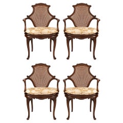 Used Set of Four English 19th Century Dark Oak Cane Armchairs