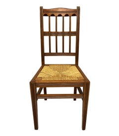 Ensemble de quatre chaises de salle à manger du mouvement esthétique anglais