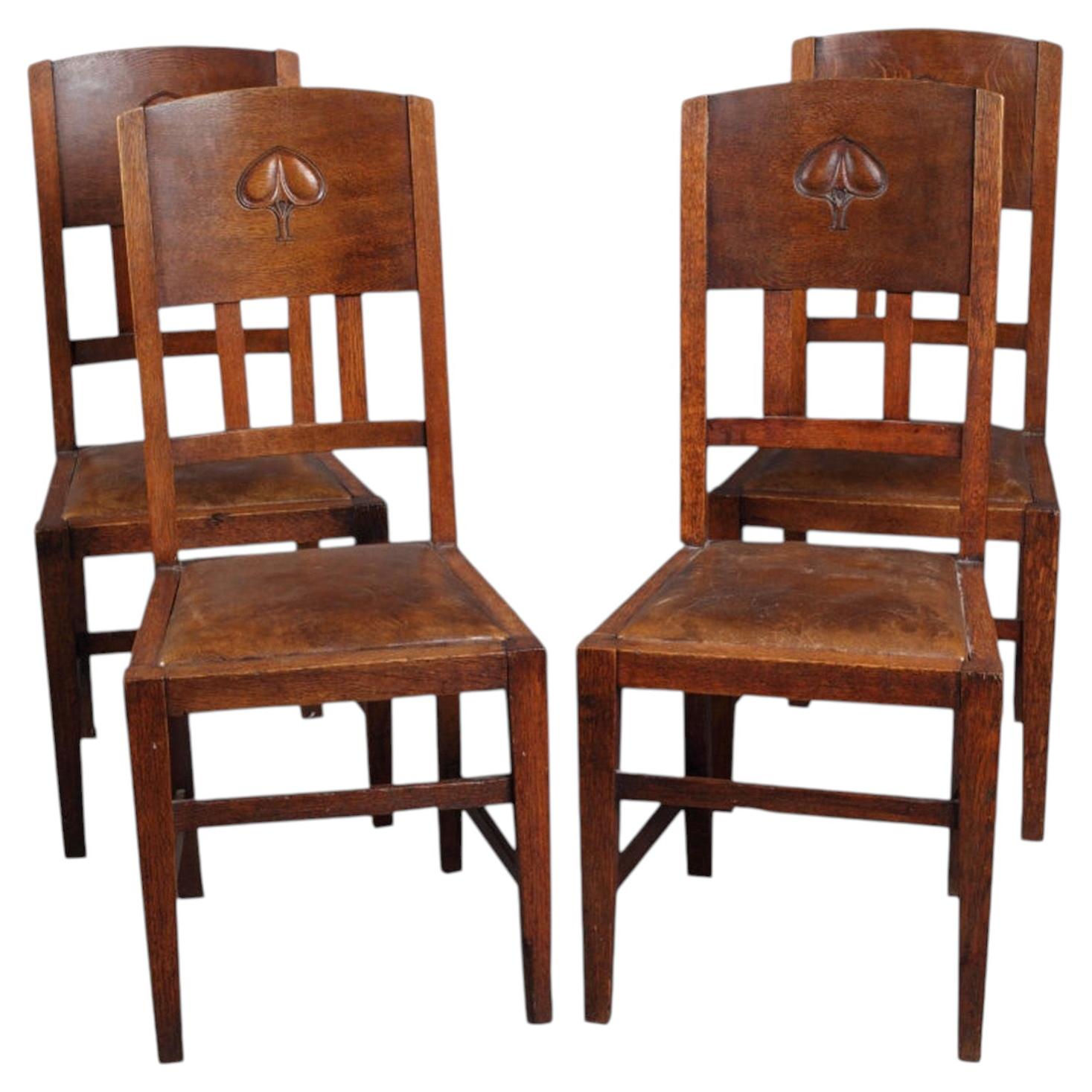 Set of Four English Arts and Crafts Oak and Leather Chairs by W. J. Neatby
