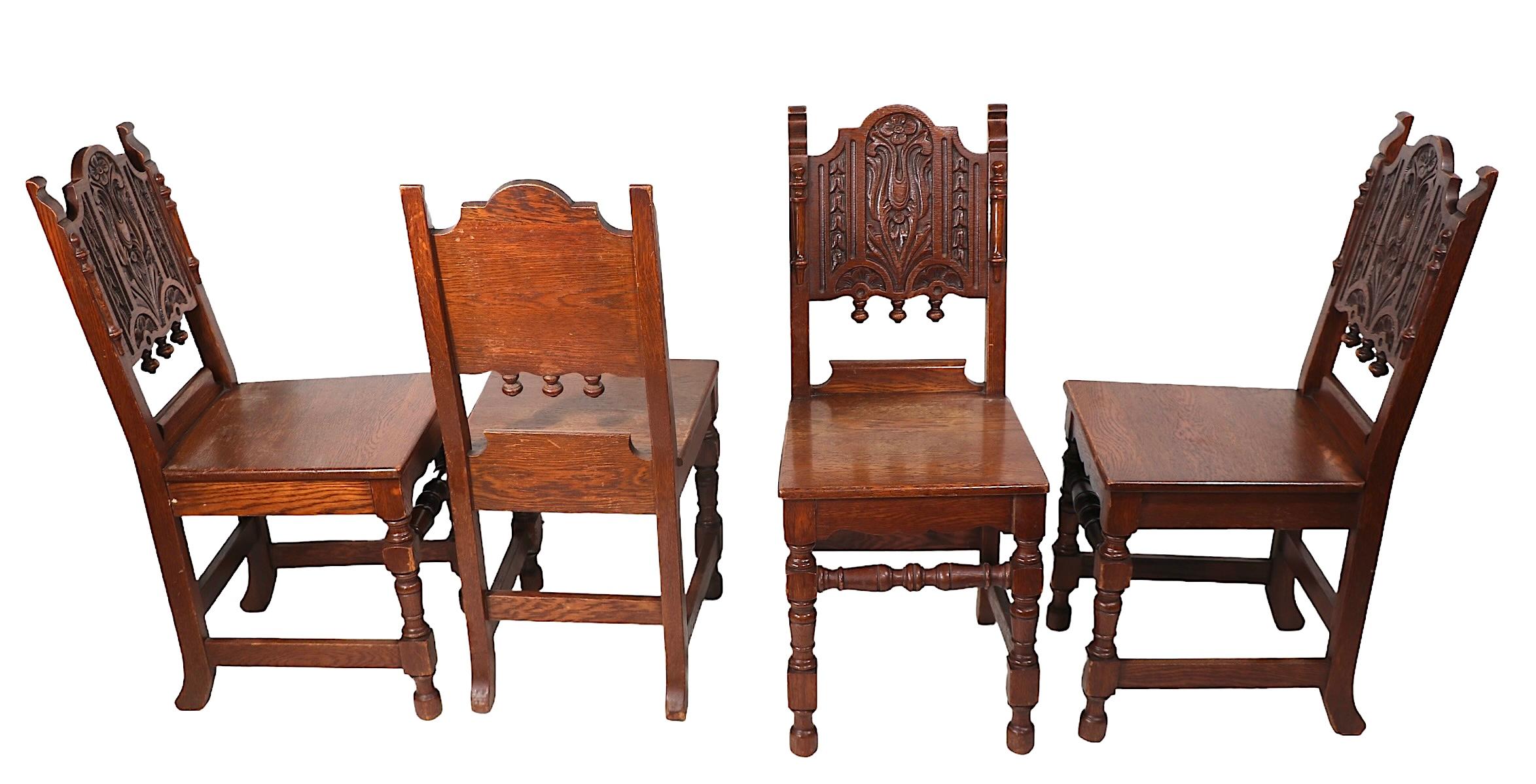 Set of Four English Carved Oak Cafe Dining Chairs in the Jacobean Style c 1920's For Sale 8