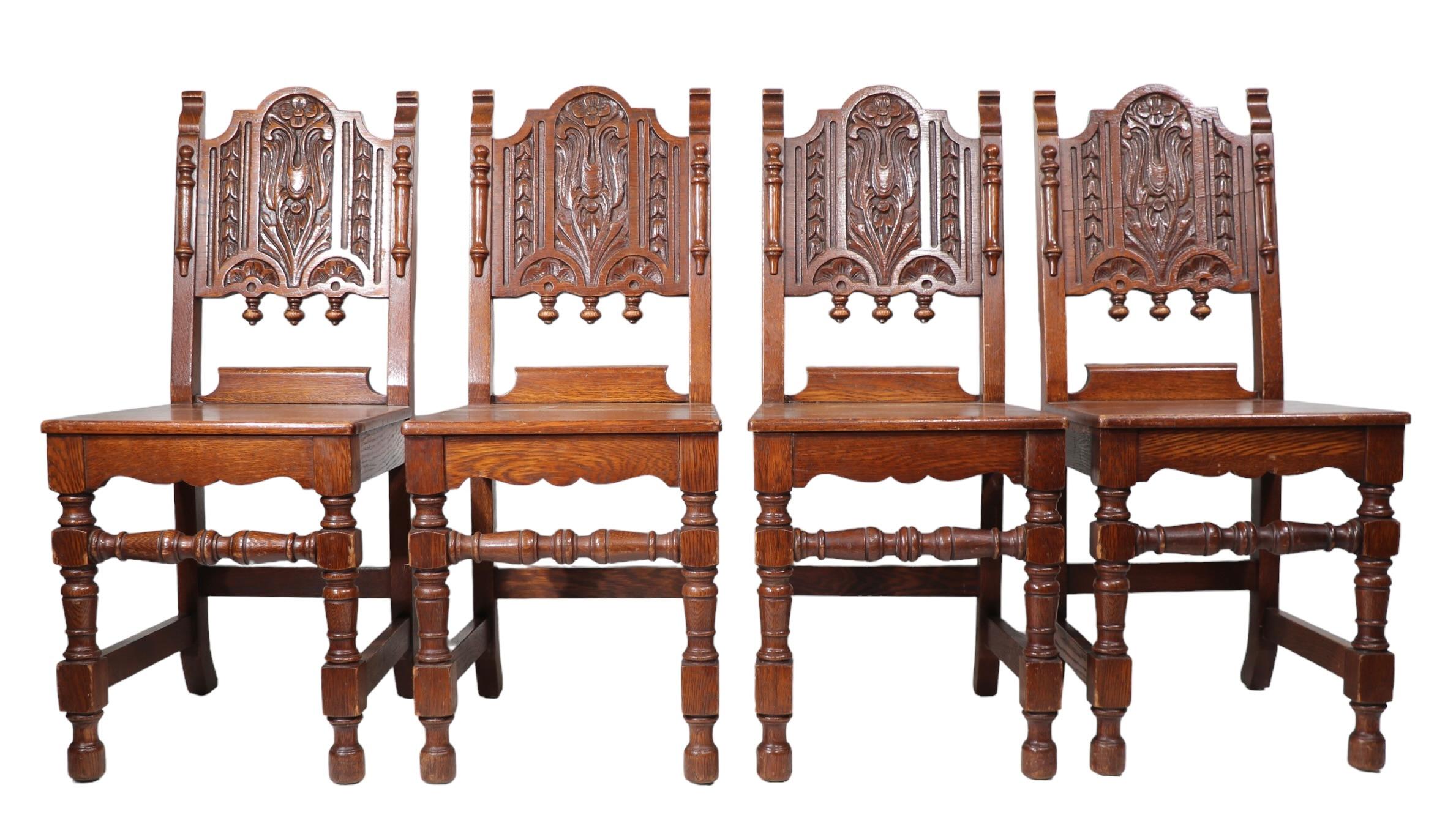 Set of Four English Carved Oak Cafe Dining Chairs in the Jacobean Style c 1920's For Sale 9