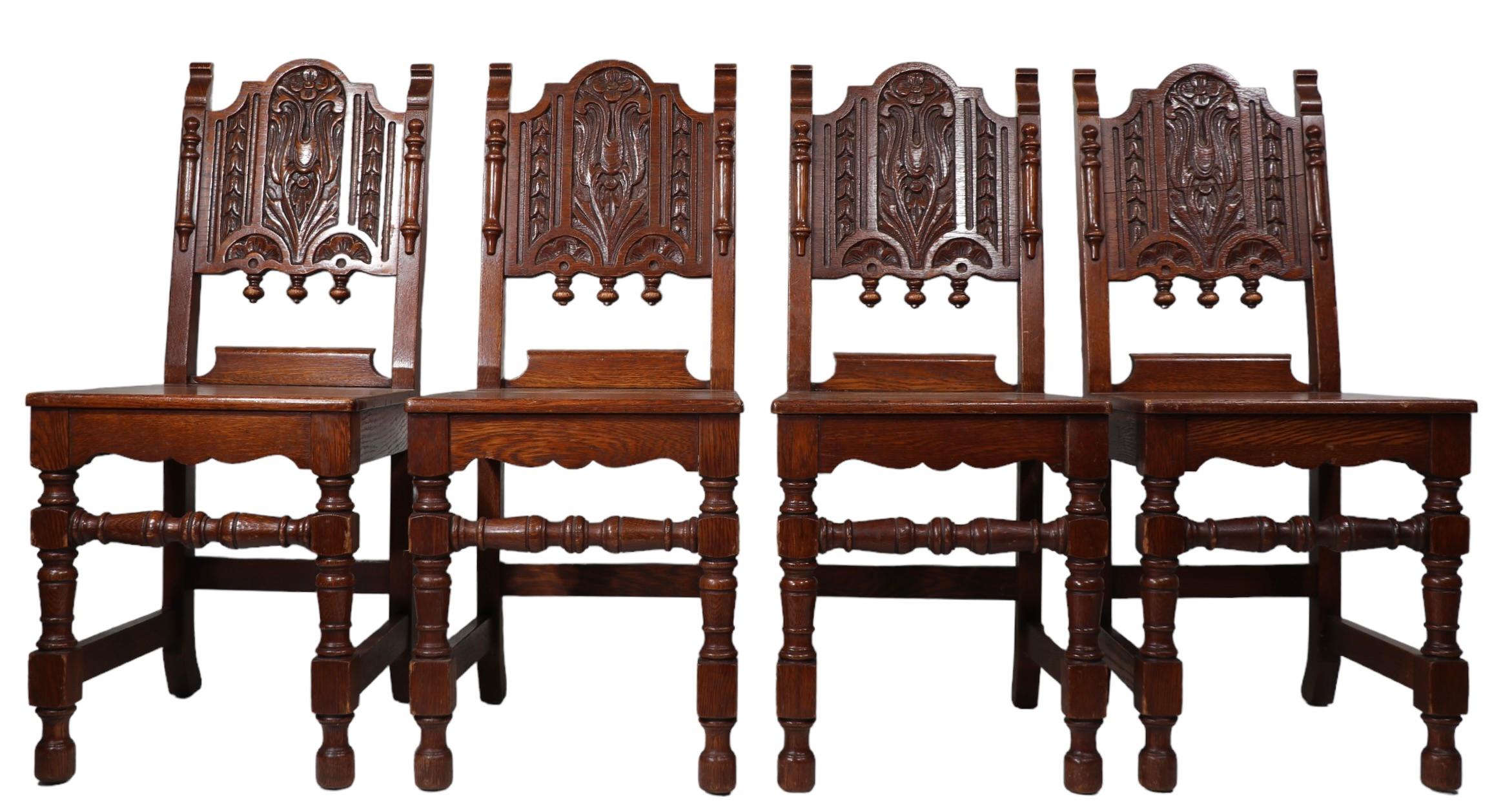 Set of Four English Carved Oak Cafe Dining Chairs in the Jacobean Style c 1920's For Sale 10