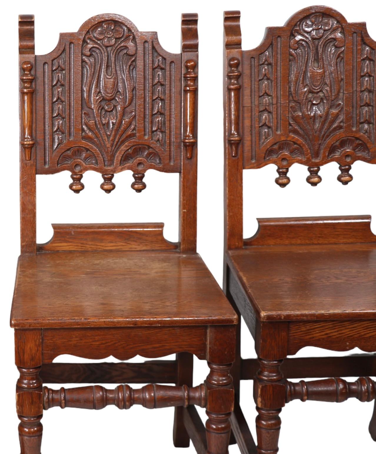 Set of Four English Carved Oak Cafe Dining Chairs in the Jacobean Style c 1920's For Sale 11