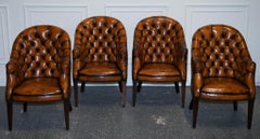 SET OF FOUR ENGLISH CHESTERFIELD HAND DYED LEATHER OFFICE LIBRARY TUB CHAiRS