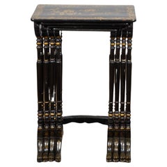 Set of Four English Chinoiserie 19th Century Black and Gold Nesting Tables