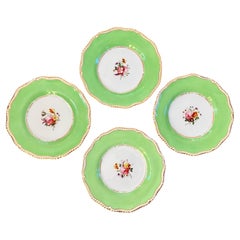 Set di quattro piatti verdi inglesi a forma di fiore