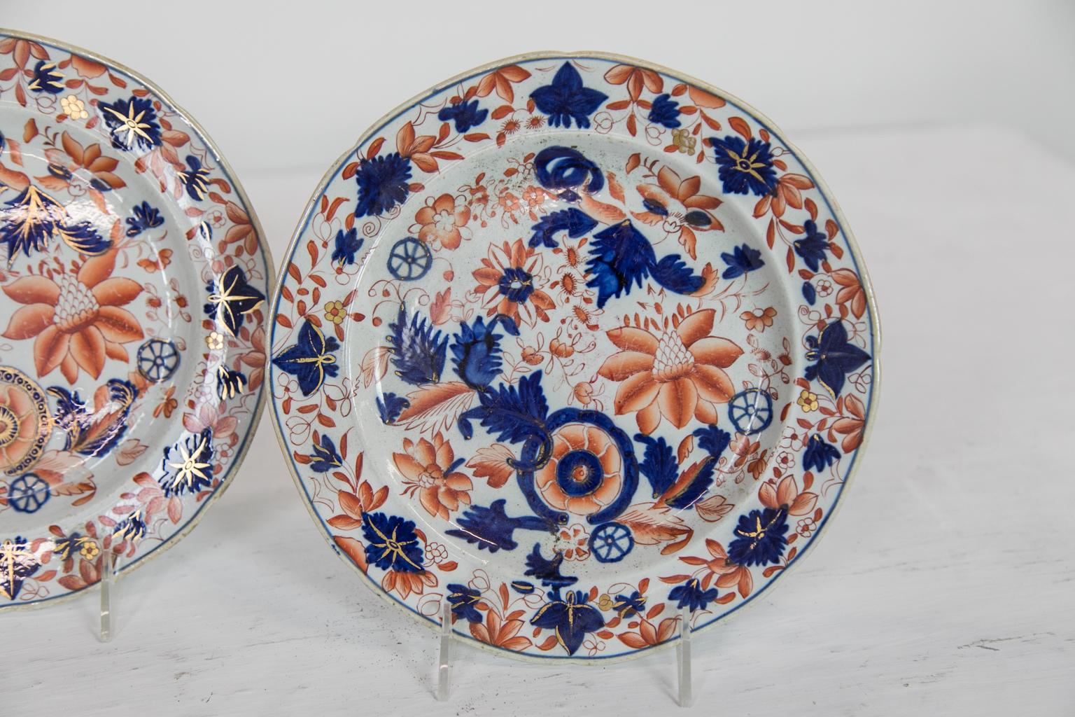 These plates have no markings, but the decoration style, glaze, style of construction, and the type of ironstone body material composition, are very consistent with that of the earliest Mason's ironstone examples. The design motifs are also typical