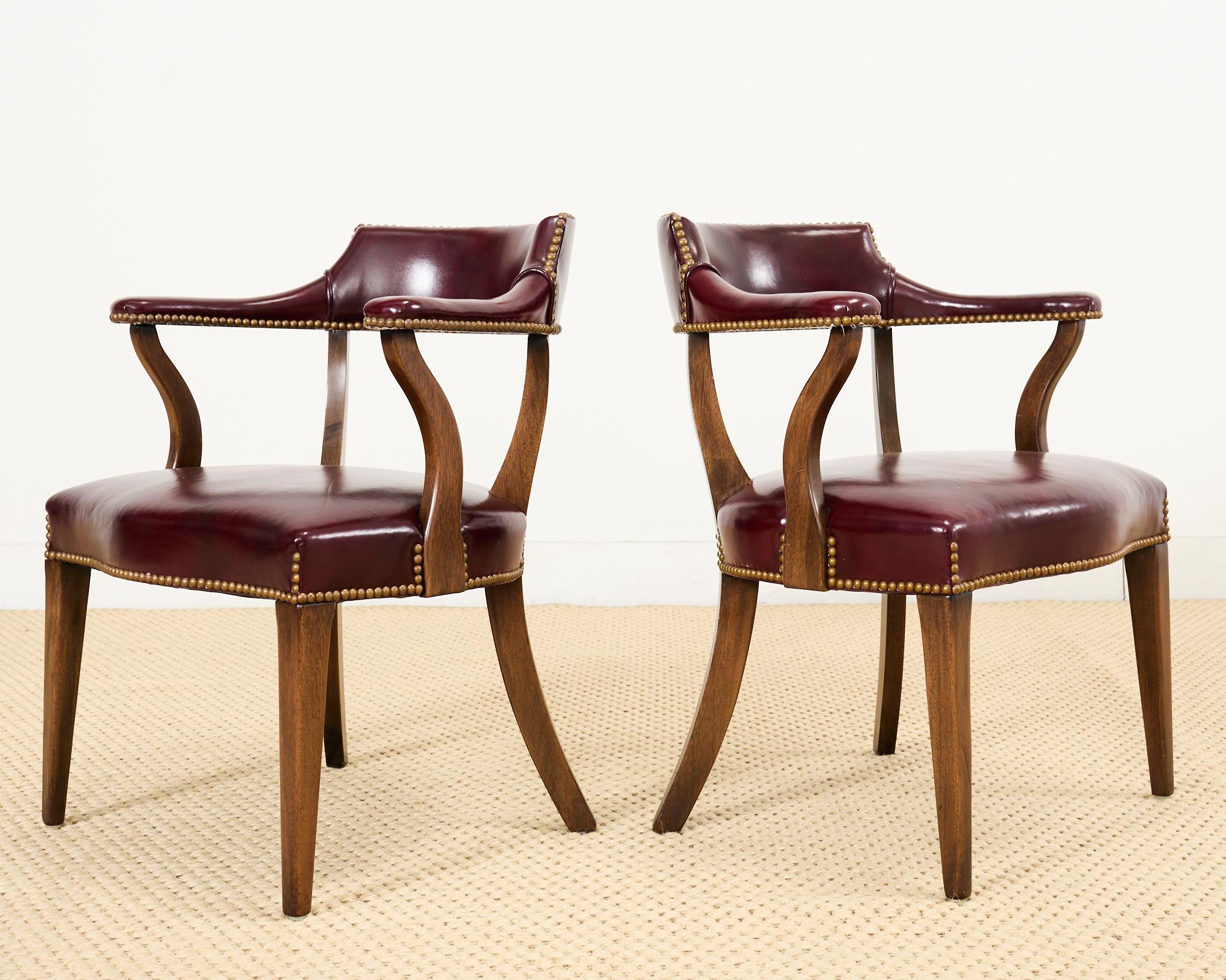 Set of Four English Mahogany Leather Captain's Pub Armchairs 1