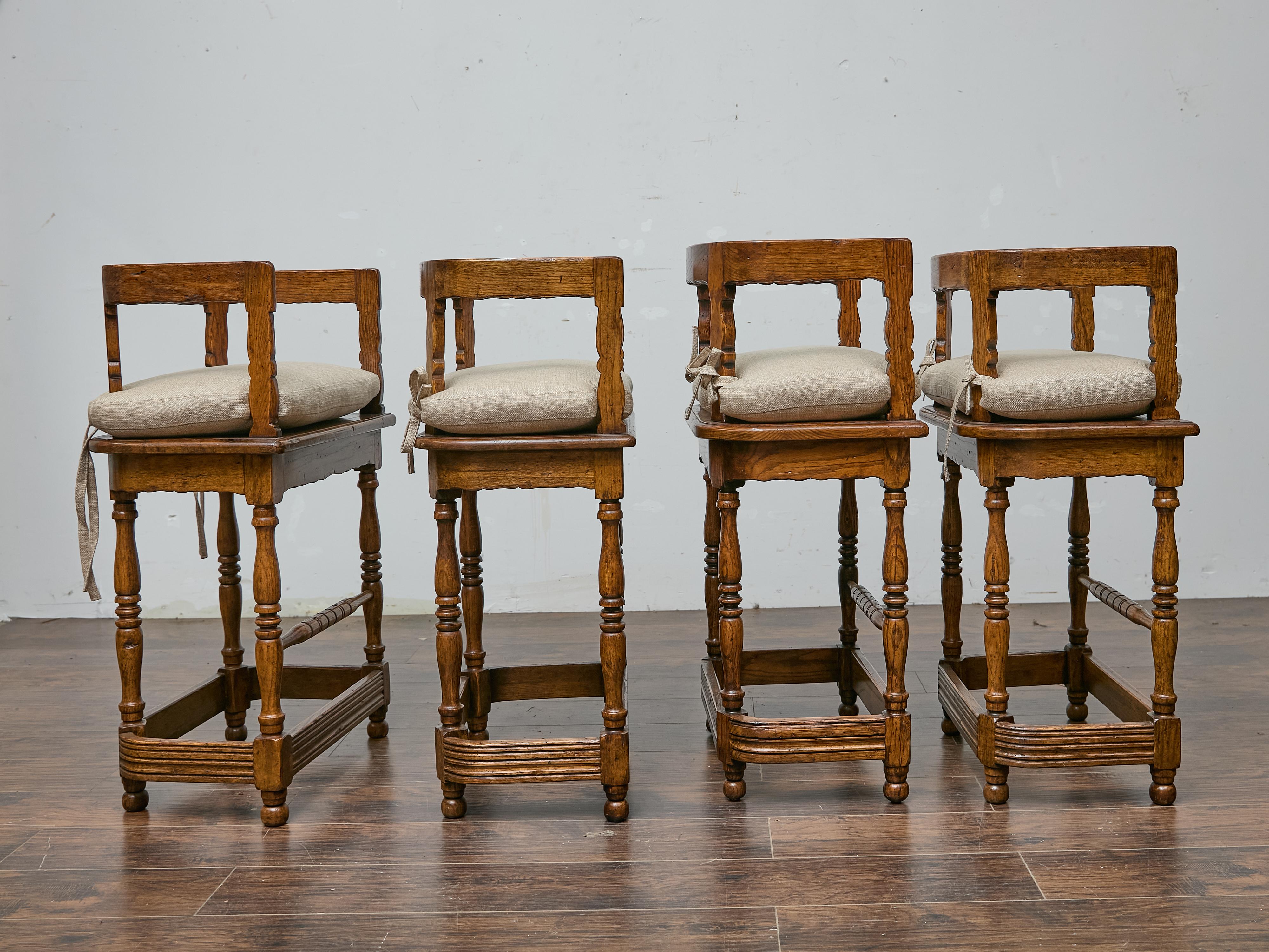 Carved Set of Four English Oak Bar Stools with Backs and Cushions, Midcentury Period For Sale