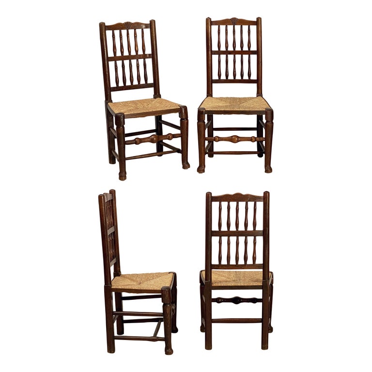 Set of Four English Oak Spindle Back Chairs with Rush Seats at 1stDibs