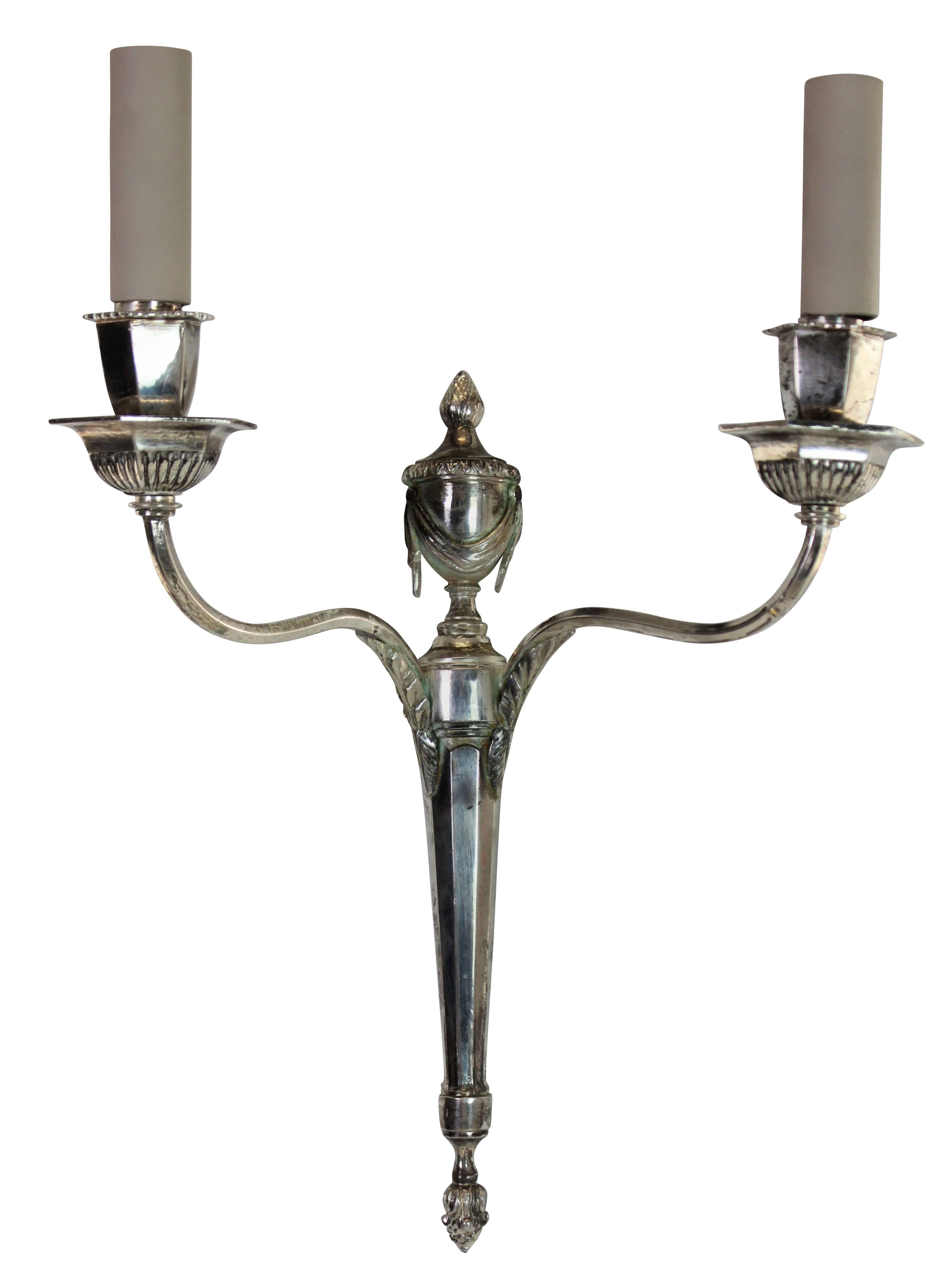 A set of four English twin branch neoclassical wall sconces.

 