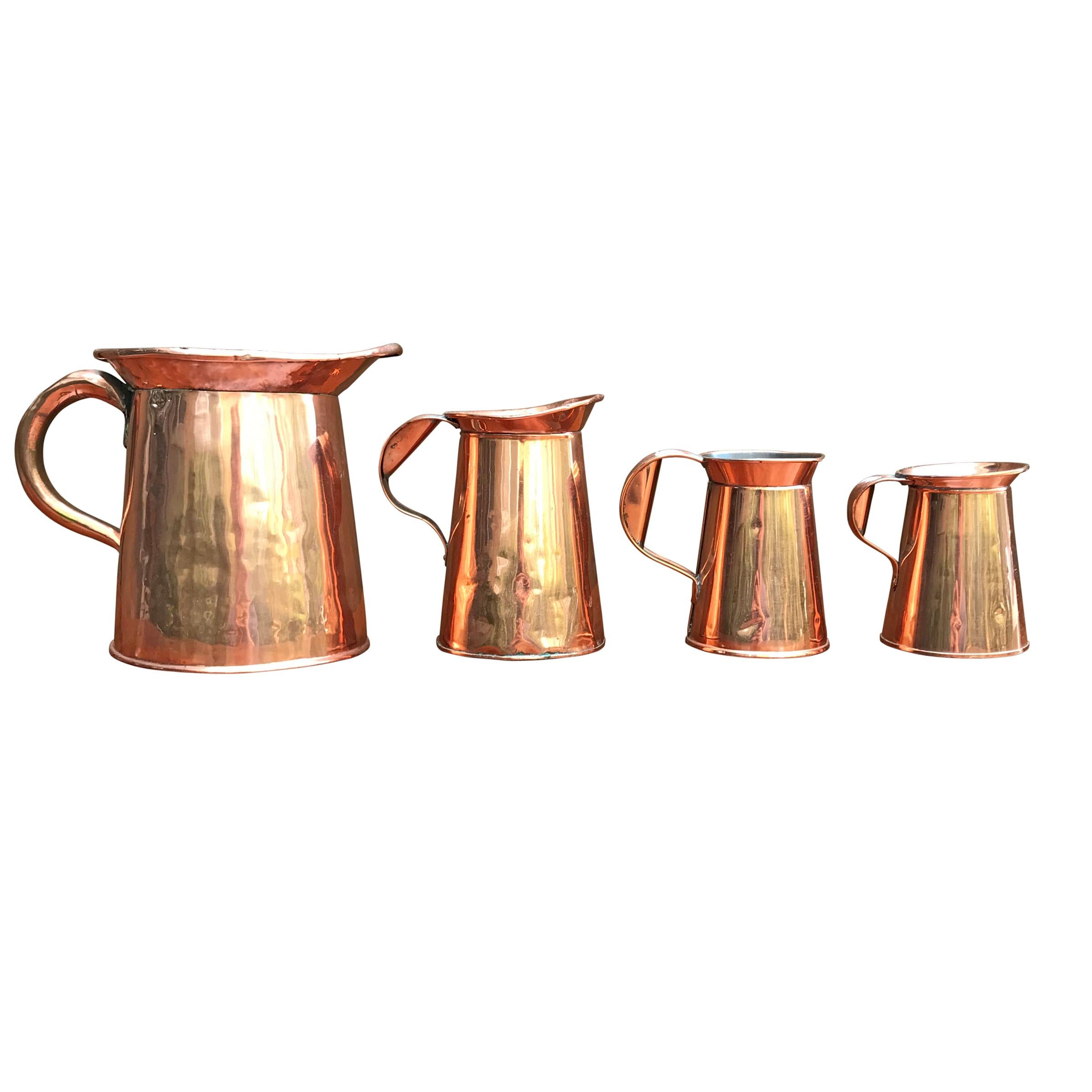 Set of Four English Victorian Period Copper Pitchers