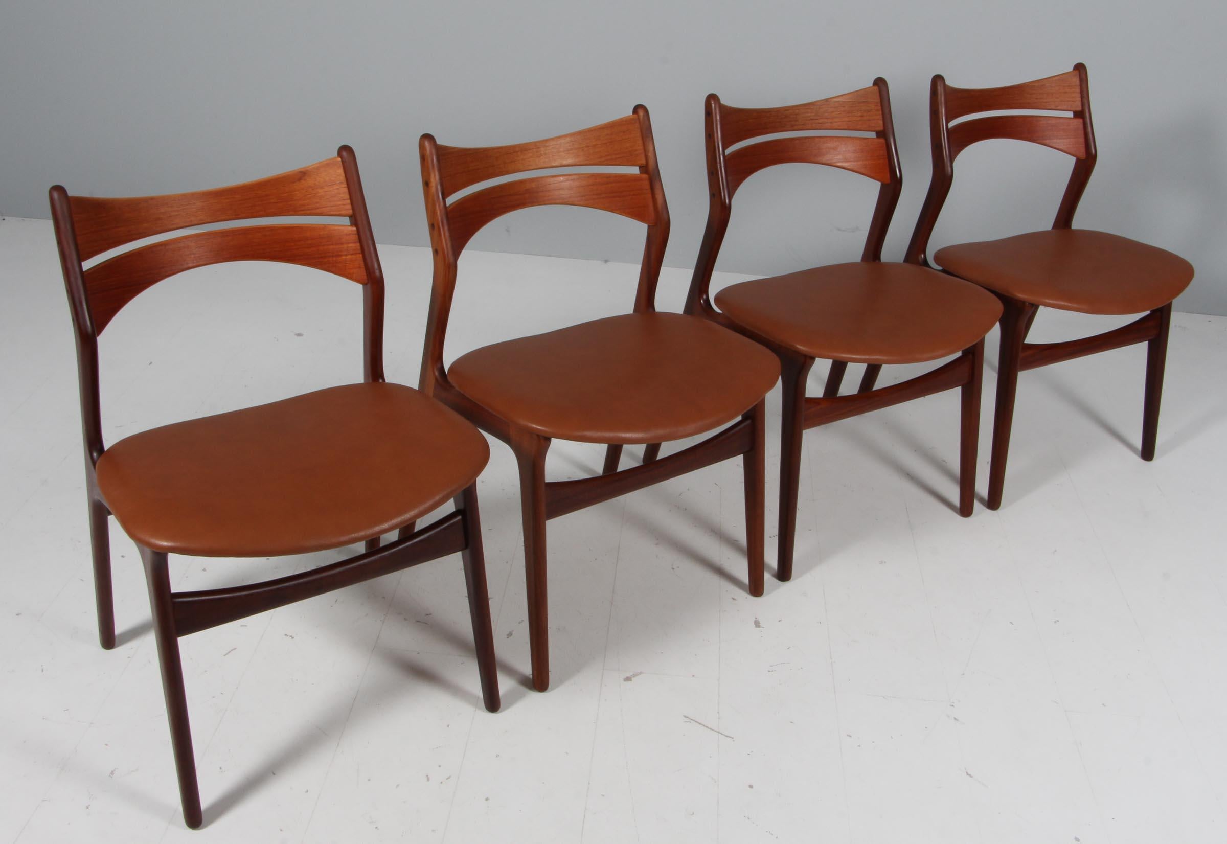 Four Eric Buch chairs with frame of partly solid teak.

New upholstered with cognac pure tan aniline leather. 

Model 310, made by Chr Christensens Møbelfabrik, Denmark.