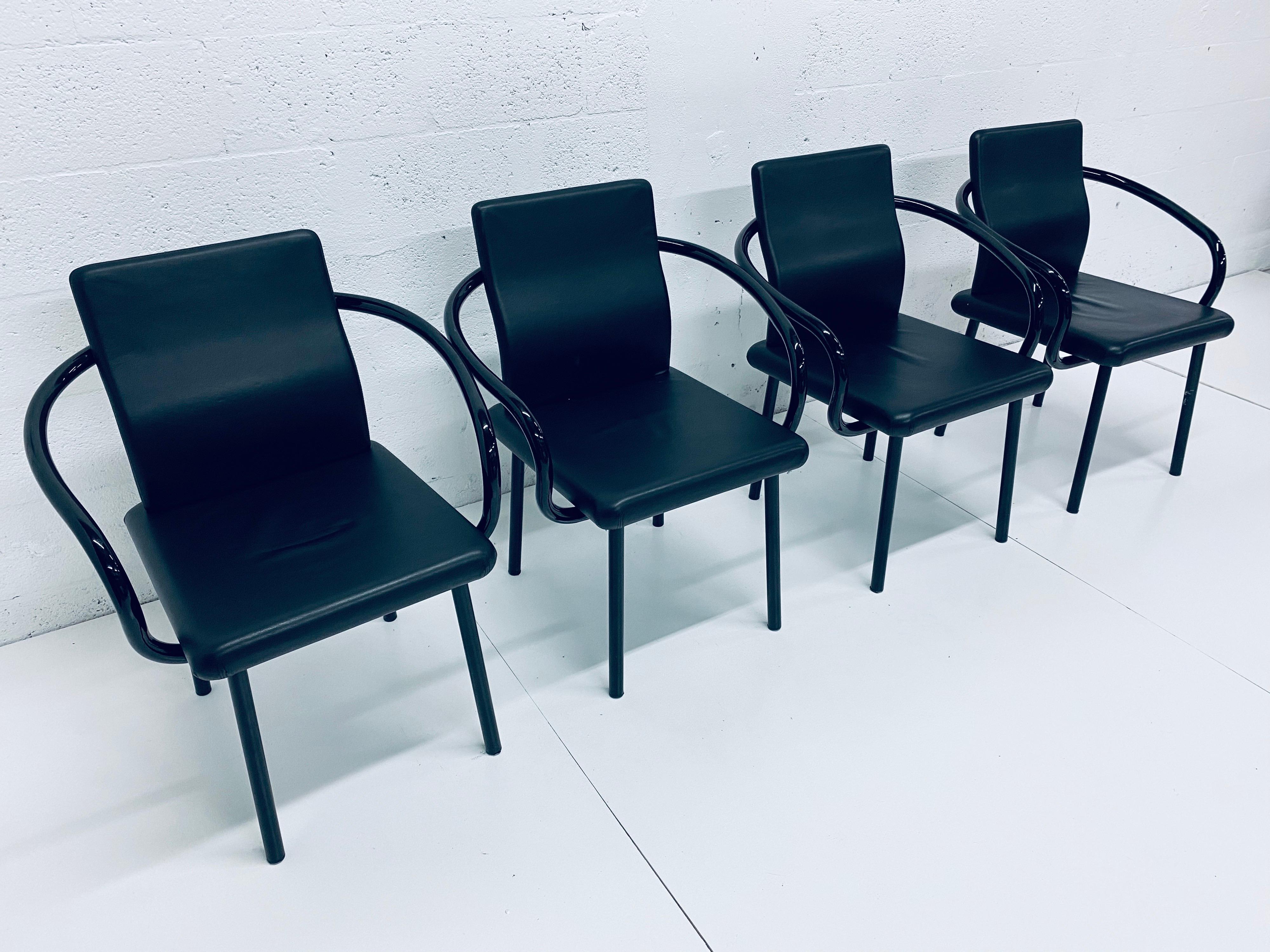 Memphis Postmodern Mandarin chairs rendered in black lacquered steel frame with black Naugahyde cushioned seats designed by Ettore Sottsass for Knoll.