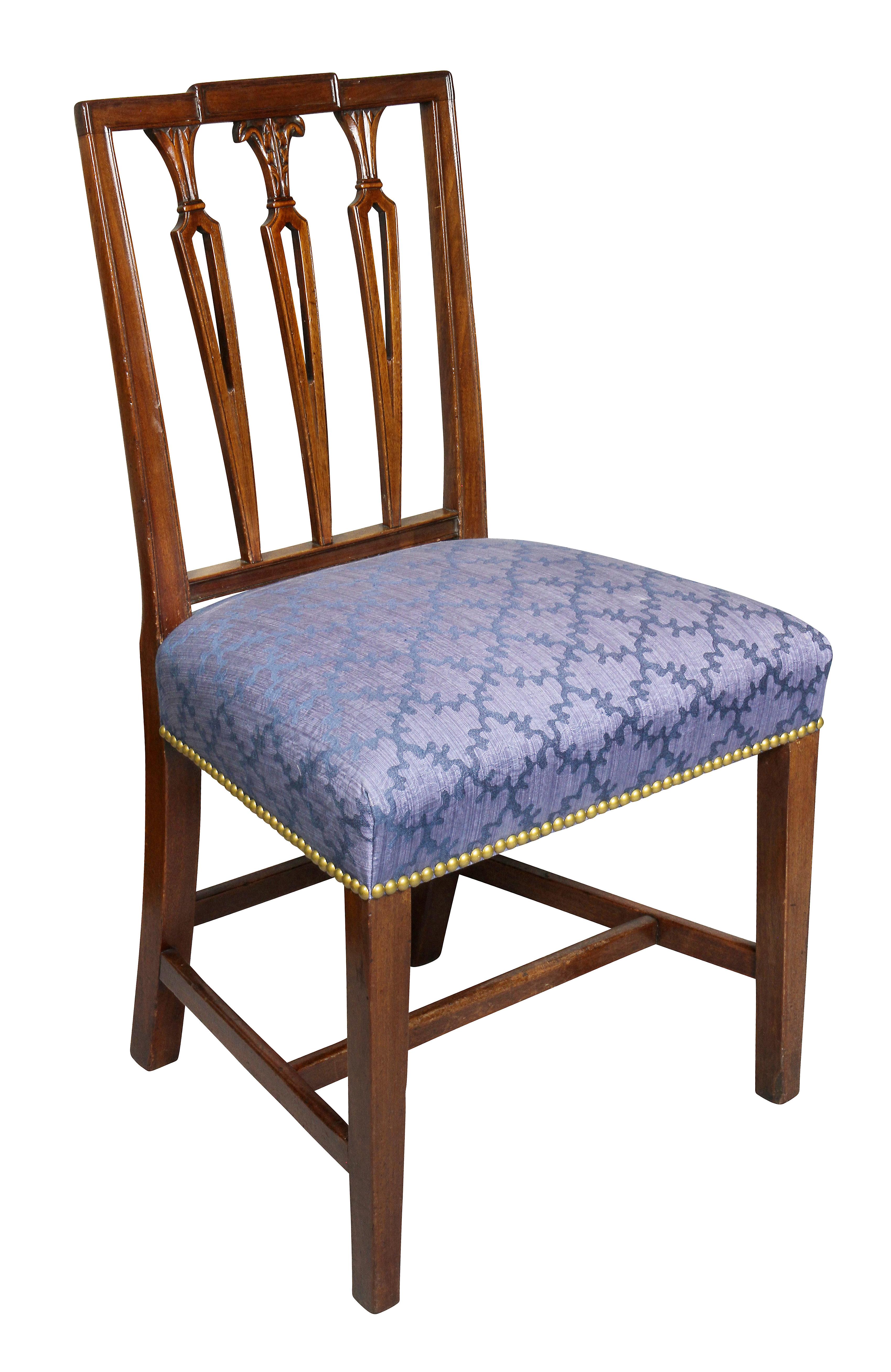Each with a square paneled crest rail over three pierced stick splats, nicely upholstered seat raised on tapered square legs and H form stretcher.
