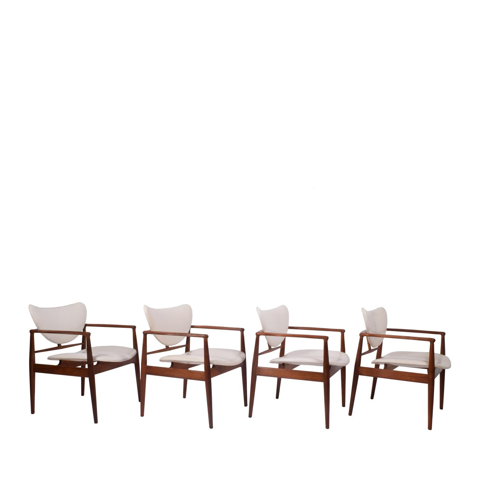 Four Finn Juhl armchairs for Baker model 400 1/2 in original condition. Solid walnut and original white leather upholstery. Early 1950s production. 
Price  per pies 