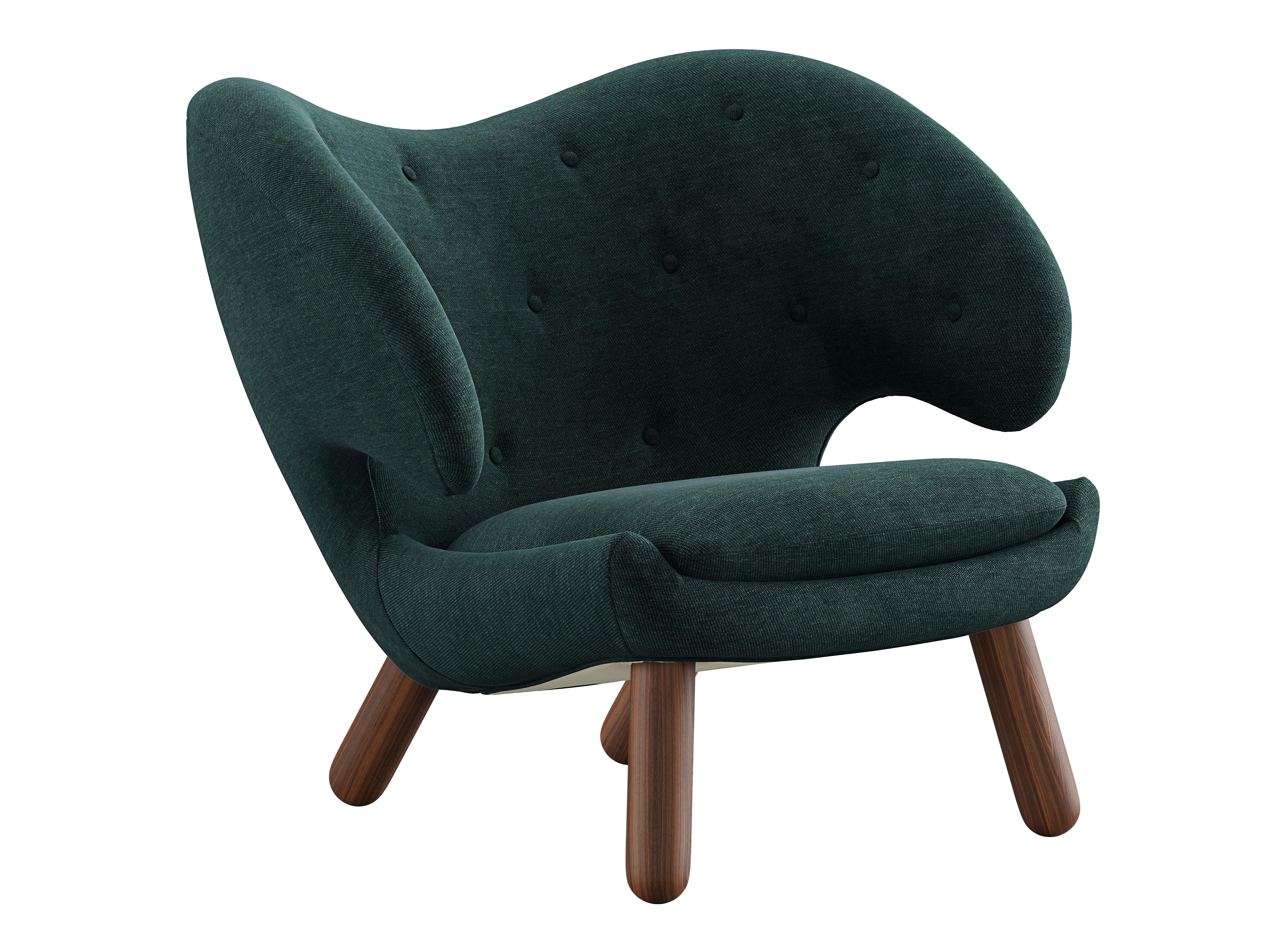 Pelican chair designed by Finn Juhl in 1940.
Manufactured by House of Finn Juhl in Denmark.

Pelican chair was probably the one furthest ahead of its time. When it was presented at the Copenhagen Cabinetmakers’ Guild Exhibition in 1940, it stood