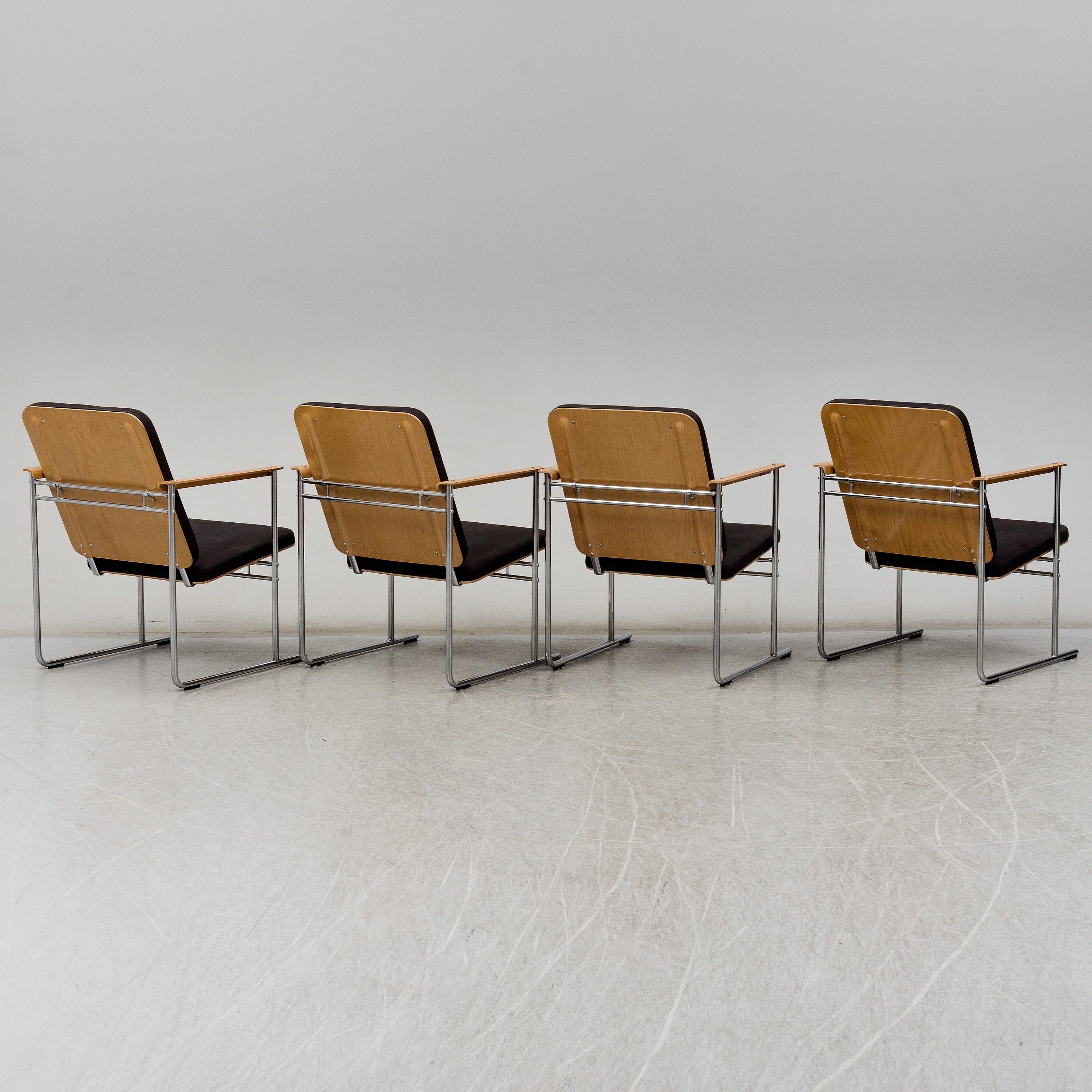 Set of four open armchairs model 'Skaala' designed by Finnish architect Yrjö Kukkapuro for Avarte Finland. Labelled by the manufacturer.

Seat, backrest and armrests of formed birch plywood, edges natural, textile original Finnish upholster in