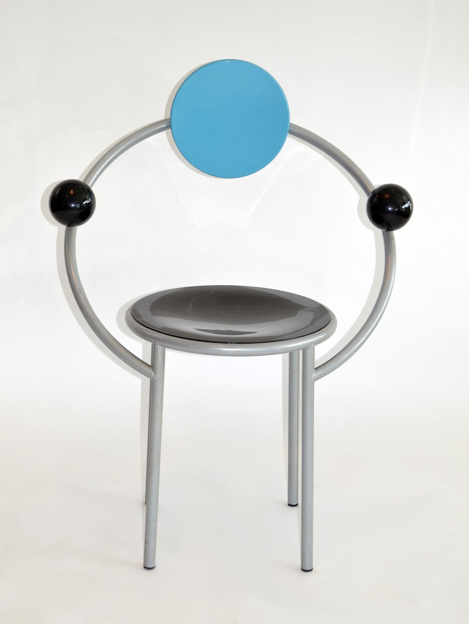 Set of Four 'First' chairs by Michele de Lucchi for Memphis 1980's Milan, Italy
Hard-to-find set of the dynamic, iconic design. Lacquered wood seats and moveable backrests mounted on an enameled metal frame with decorative lacquered wood orb
