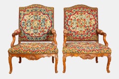 Set di quattro poltrone a schienale piatto del periodo Regency.