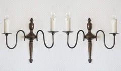 Set of Four Flemish Style Brass Two-Light Wall Sconces