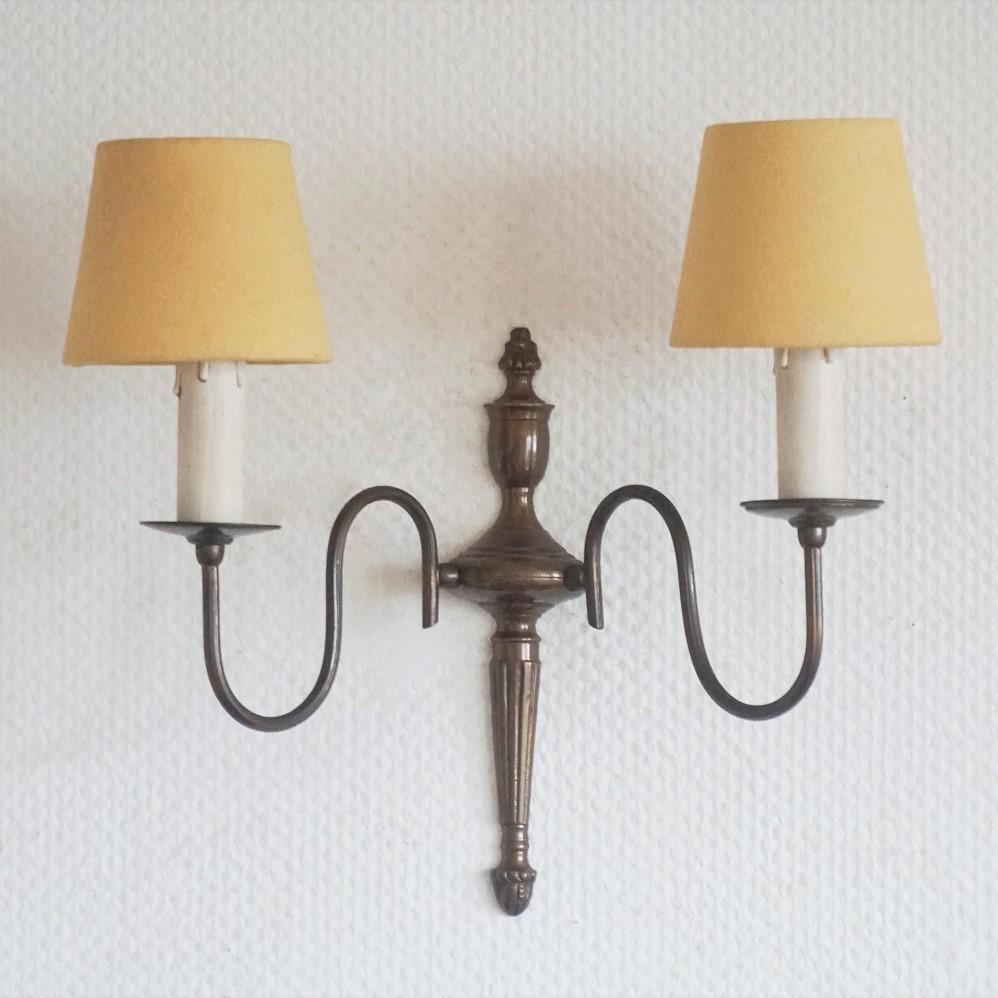Dutch Set of Four Flemish Style Brass Two-Light Wall Sconces