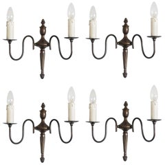 Set of Four Flemish Style Brass Two-Light Wall Sconces
