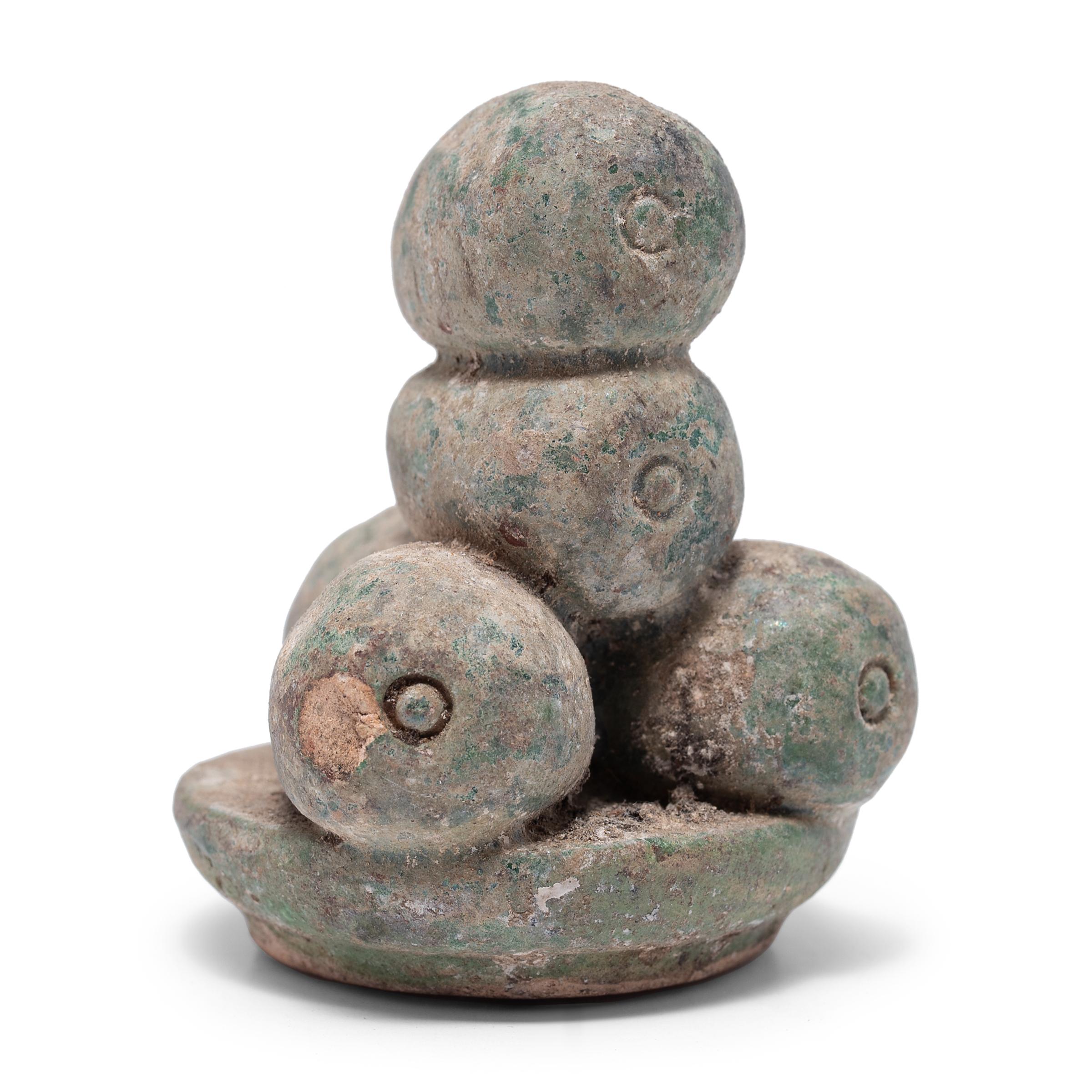 These petite ceramic sculptures are a type of centuries-old burial figurine known as míngqì or 
