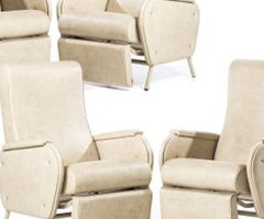 Set of four footrest chairs