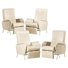 Set of four footrest chairs