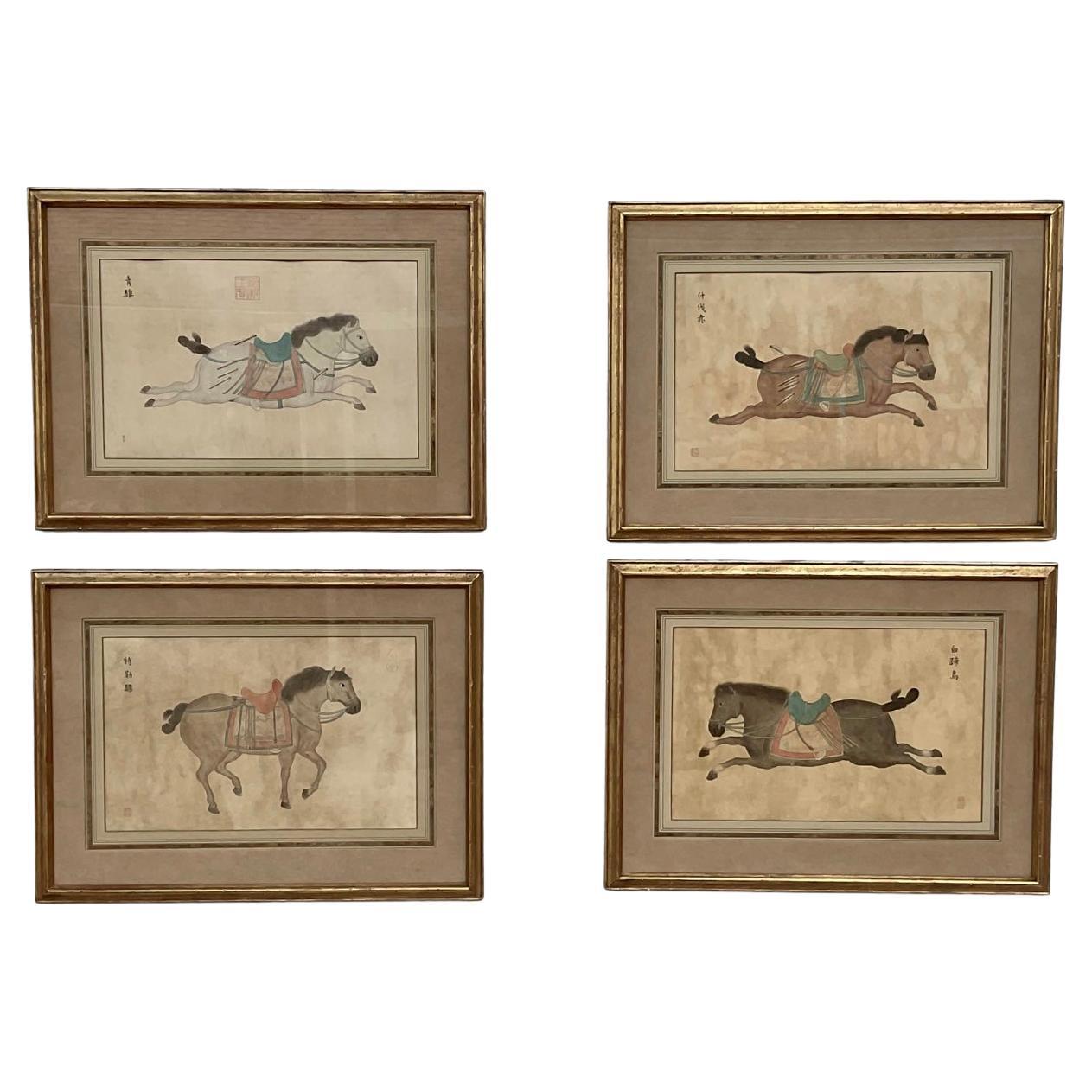 Beautiful set of four watercolor Chinese T’ang style horses. Gilt framing on all four. Very good condition with minor wear on frames. 

