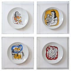 Ensemble de quatre assiettes en porcelaine F. Leger encadrées