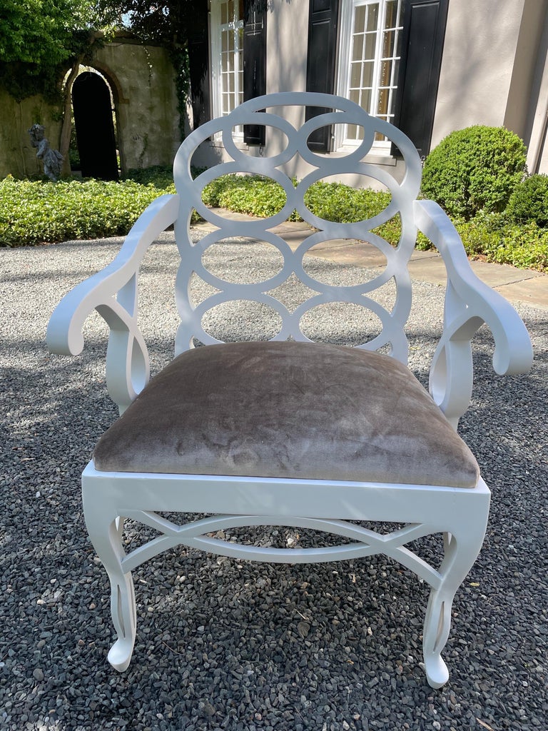 A fabulous set of four Frances Elkins loop chairs. The armchairs are based on the 1930’s iconic models. This set of vintage chairs were made in the mid 20th century and have been professionally restored and painted in a matte white finish. Newly