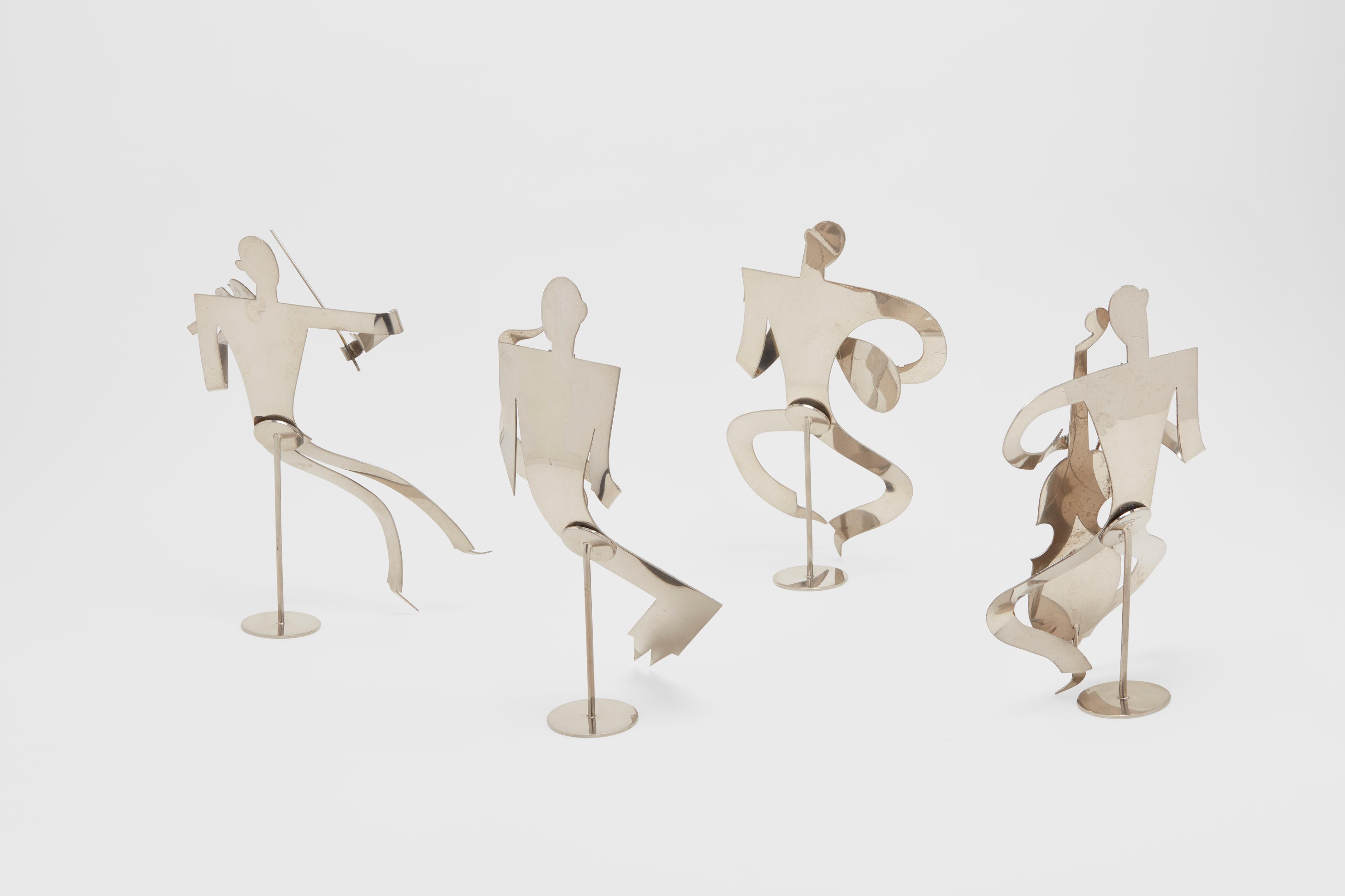 A four piece, complete, set of jazz musician sculptures in nickel plated bronze. This stunning and very rare jazz ensemble was created by the uniquely creative Franz Hagenauer. Franz was a second generation Hagenauer working out of the Werkstätte