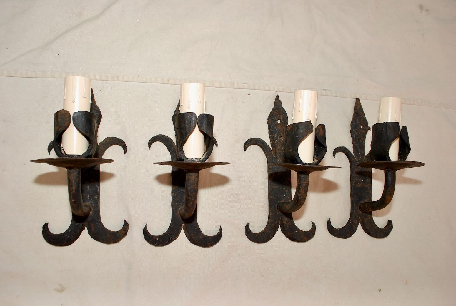 Spanish Colonial Set of Four French 1930s Wrought Iron Sconces ( two are sold )