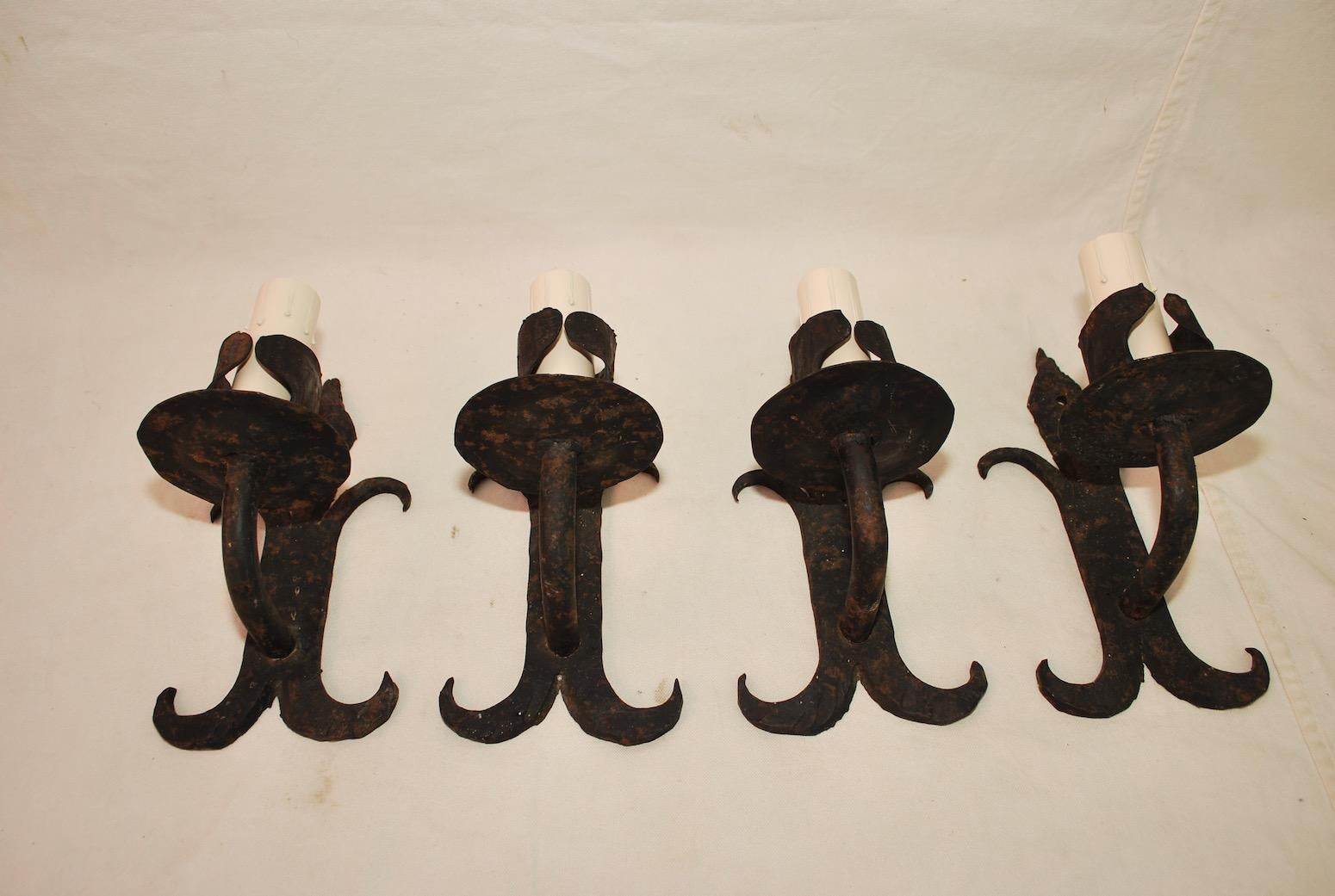 Set of Four French 1930s Wrought Iron Sconces ( two are sold ) 1