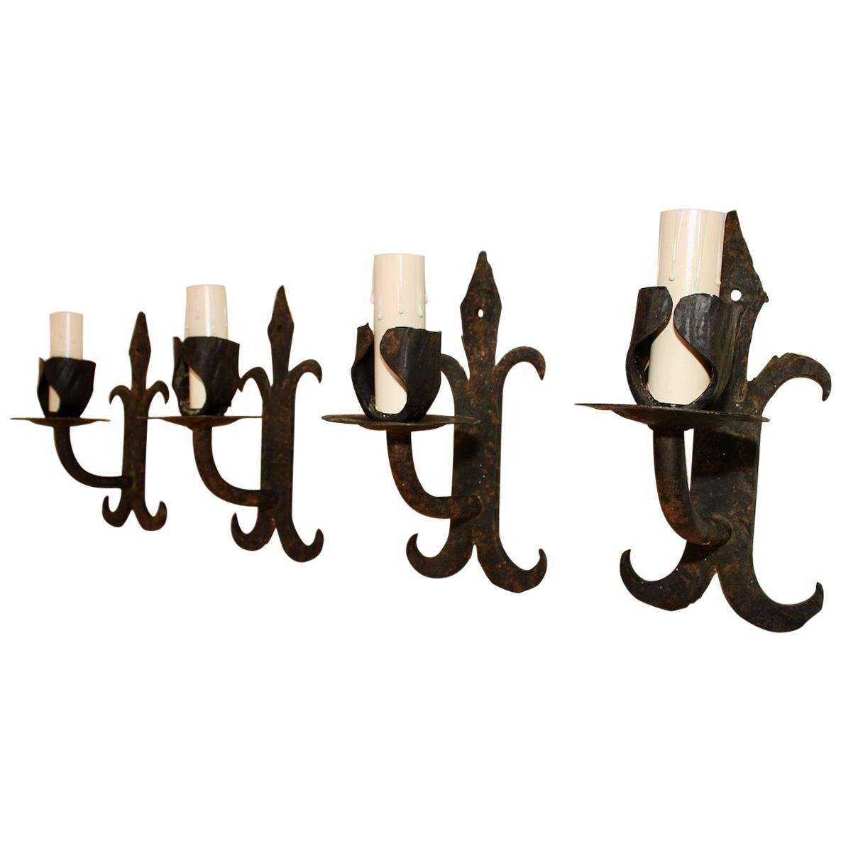 Set of Four French 1930s Wrought Iron Sconces ( two are sold )