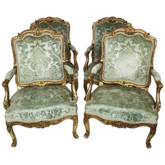 Set of Four French 19th Century Louis XV Rococo Style Gilt Wood Carved Armchairs