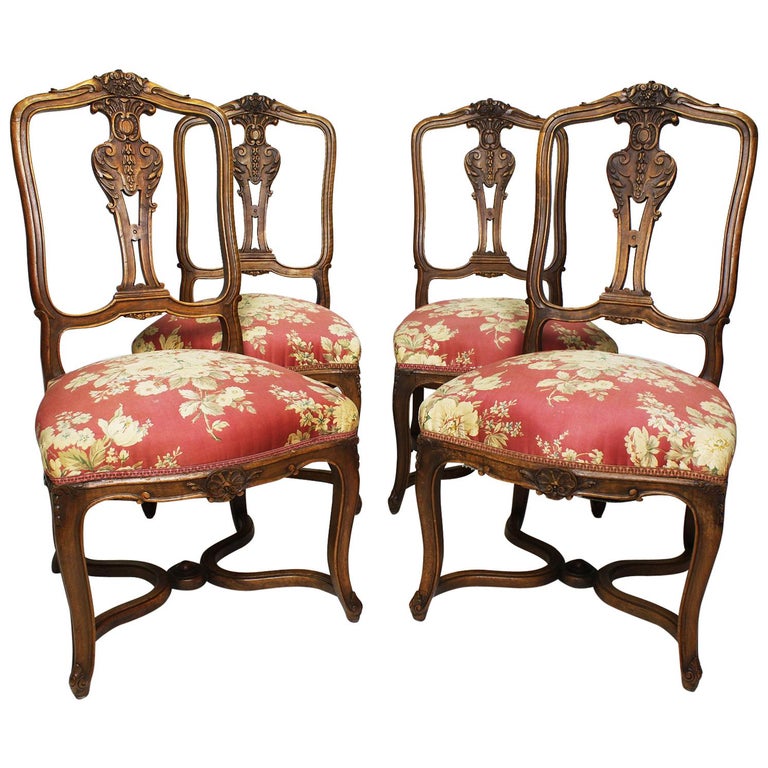 Set of Four French 19th Century Louis XV Style Carved Walnut