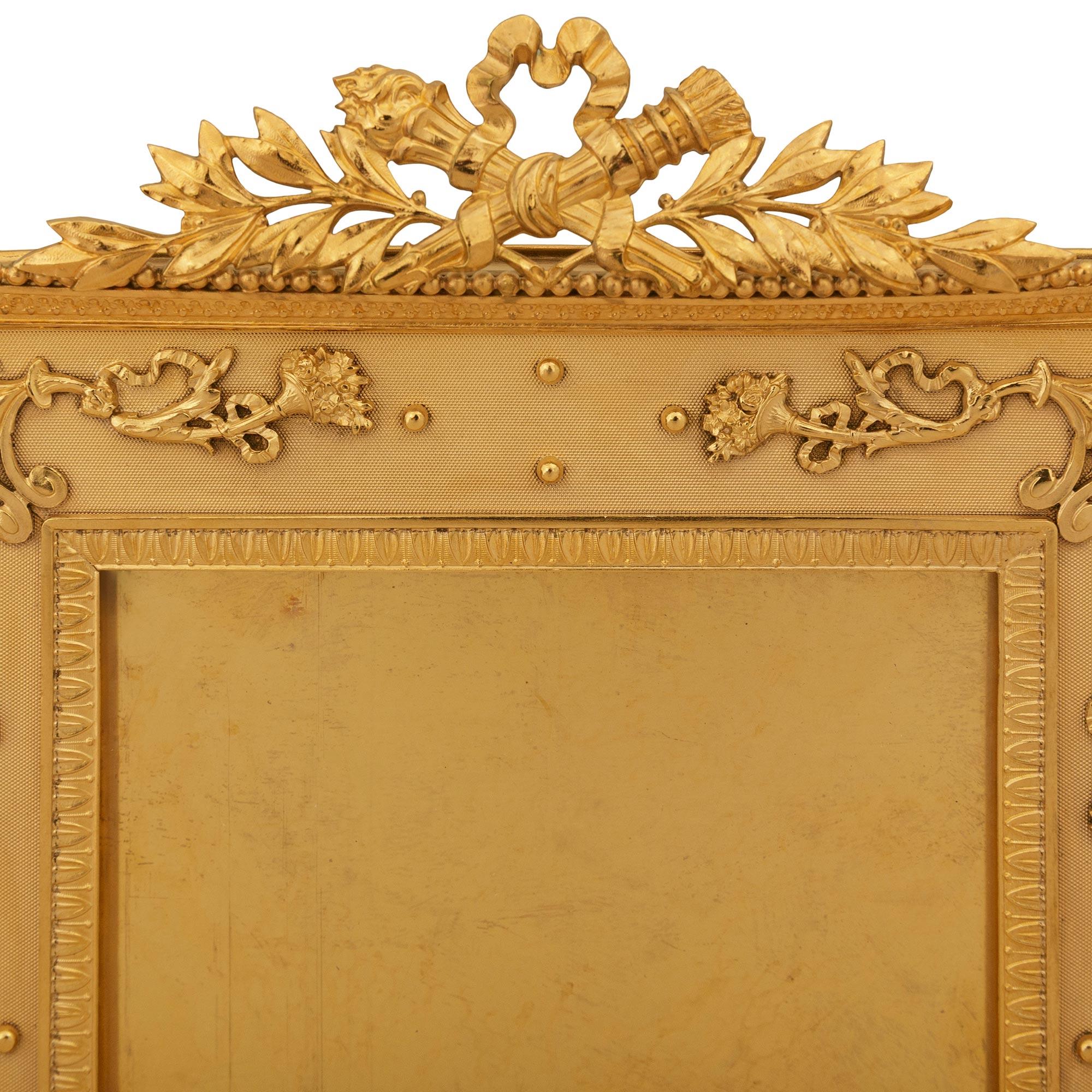 19th Century set of four French 19th century Louis XVI st. Ormolu picture frames For Sale