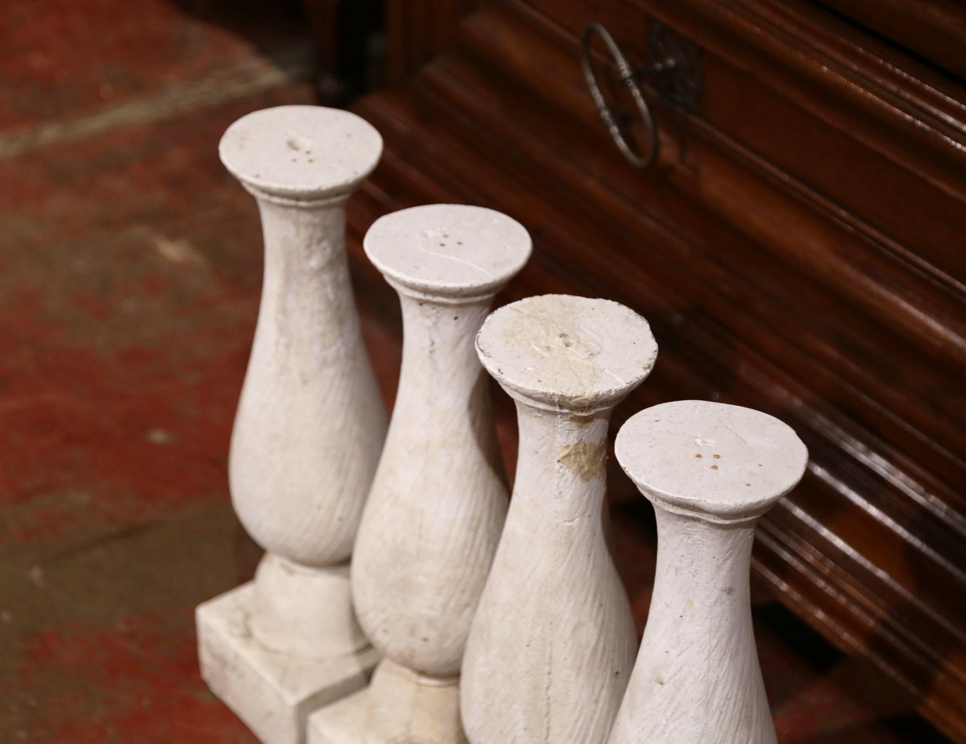 Hand-Carved Set of Four French 19th Century Patinated Carved Stone Balusters